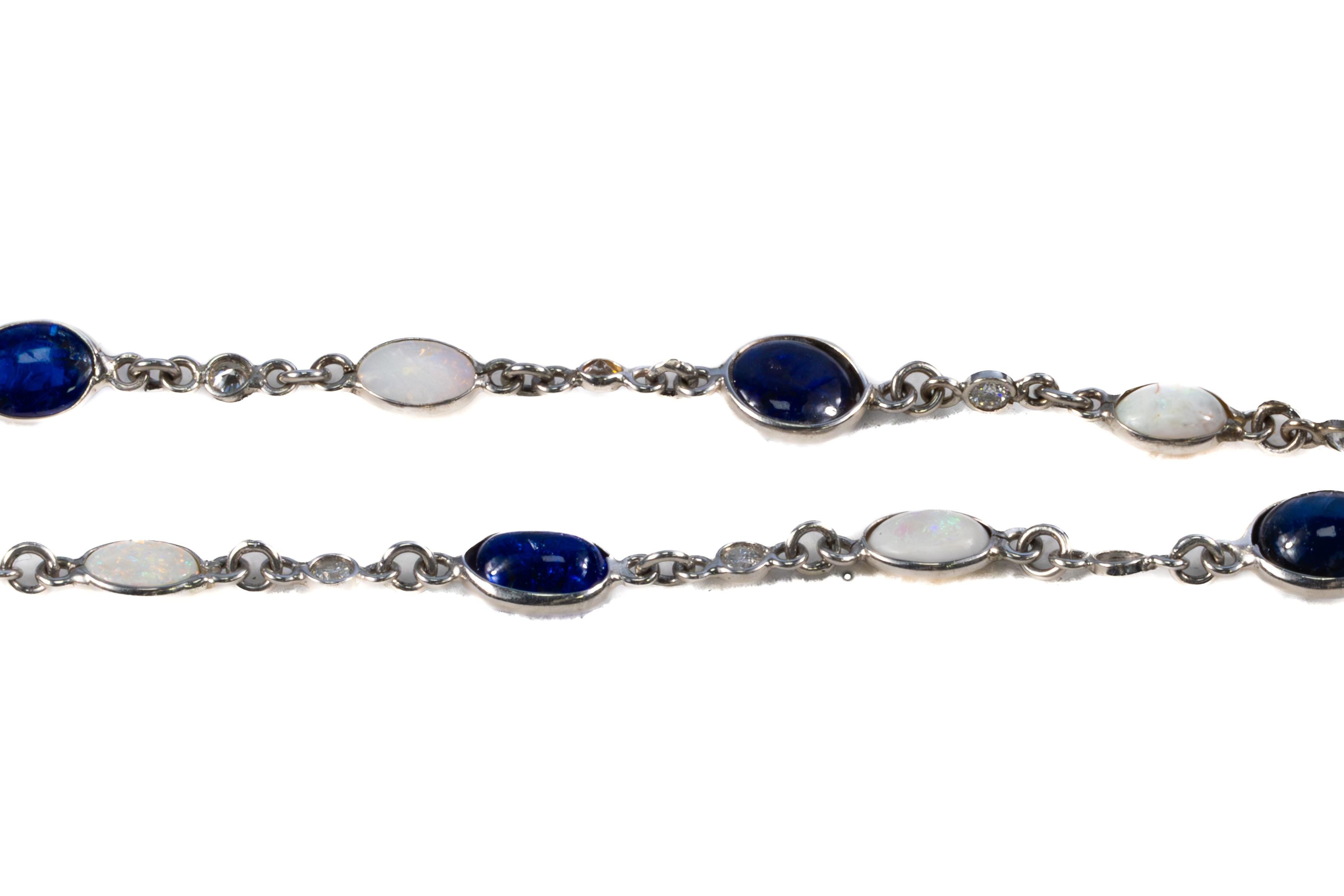 Collier de saphir et d'opale avec diamants à l'unité

Cet élégant collier de 57,5 pouces combine la beauté des saphirs, des opales et des diamants dans une pièce luxueuse qui respire la sophistication intemporelle. Avec un poids total de saphirs de