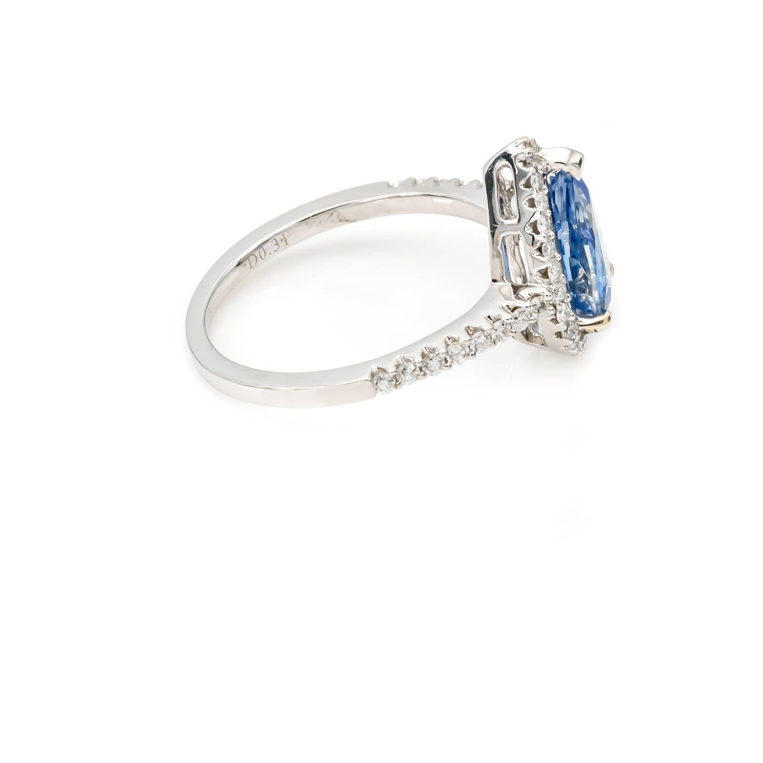 pear sapphire ring with diamond halo