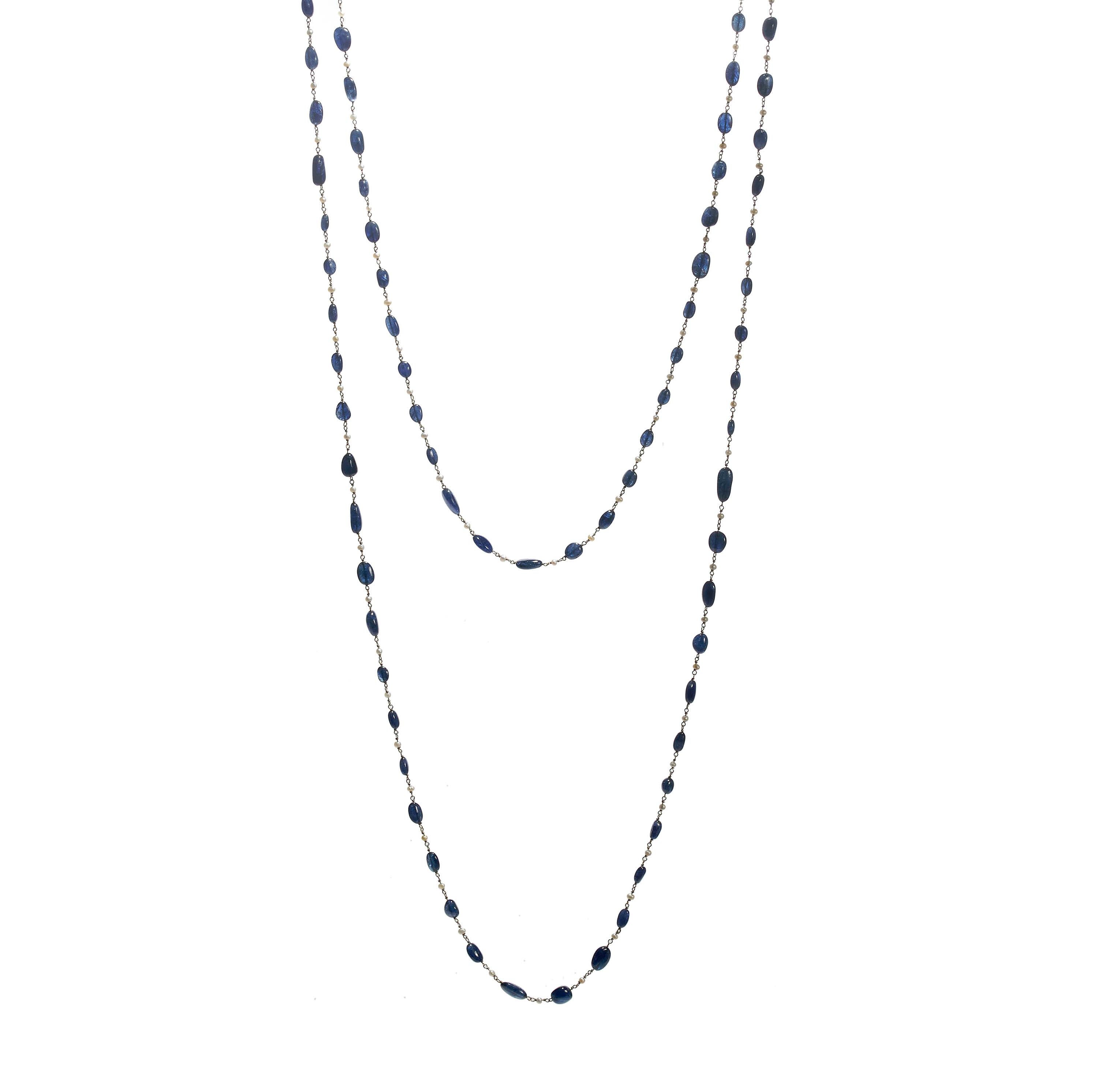 A sapphire, pearl and white gold sautoir, with sapphire 