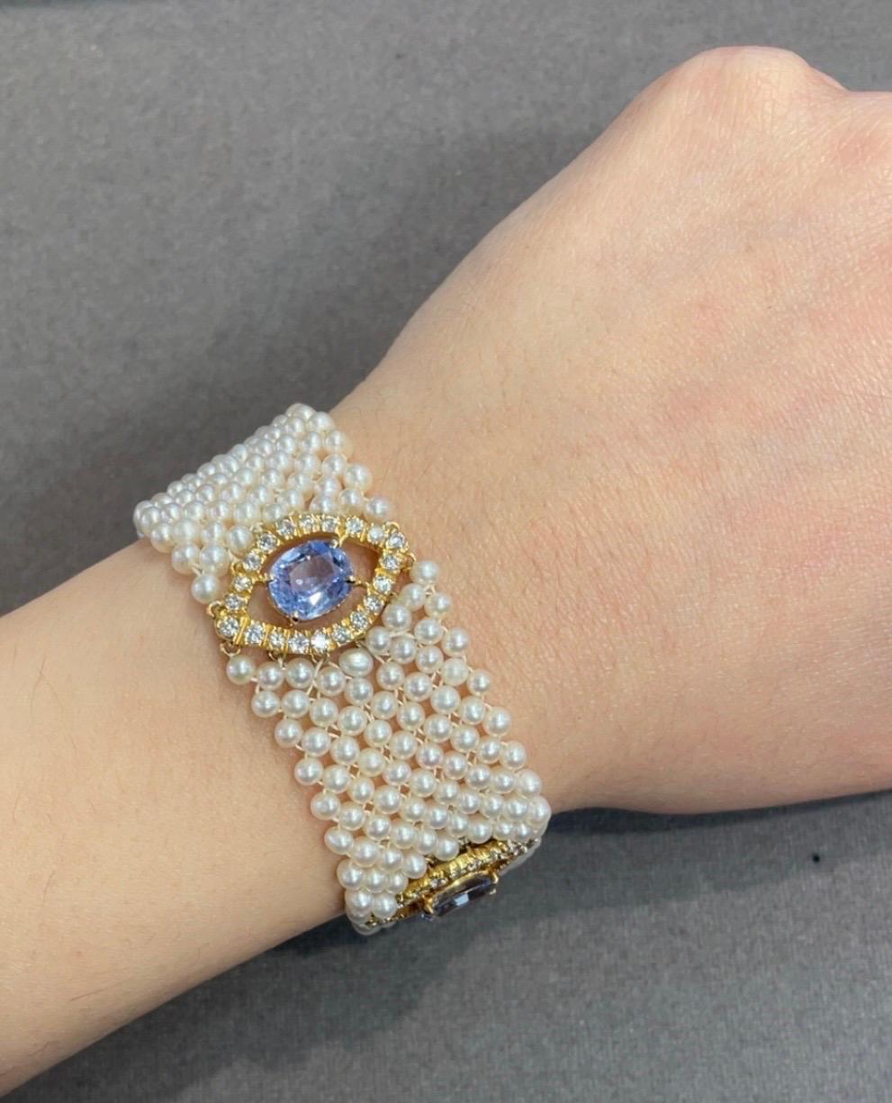 Sapphire & Pearl Mesh Bracelet

A yellow gold bracelet featuring a mesh of freshwater pearls, set with four oval sapphires. Each sapphire is surrounded by a halo of diamonds.

Approximate Diamond Weight: 3.20 carats
Approximate Sapphire Weight: