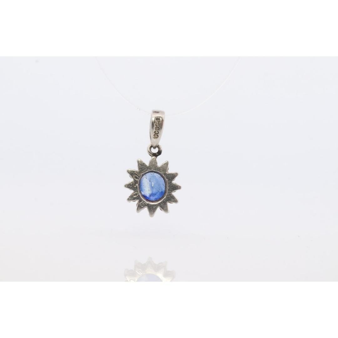 Sapphire Pendant. Genuine Sapphire and Diamond halo Platinum Pendant. PT900 Plat 1