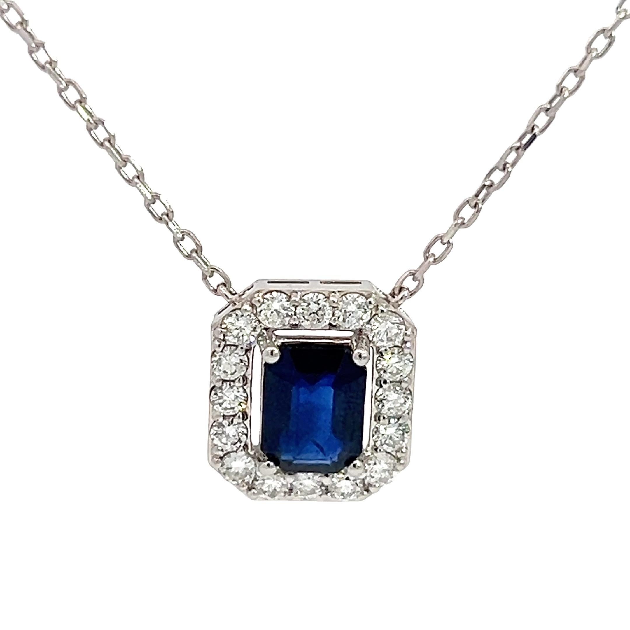 Sapphire Pendant in 14k white gold with Natural Diamonds & 2.05ct Emerald Cut Blue Sapphire
This pendant is crafted from 14k white gold, giving it a sleek and modern appearance. At its center is a stunning 2.05-carat emerald-cut natural blue