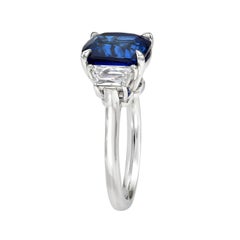 5.03 Carat Royal Blue Sapphire Cushion Three Stone Platinum Engagement Ring
