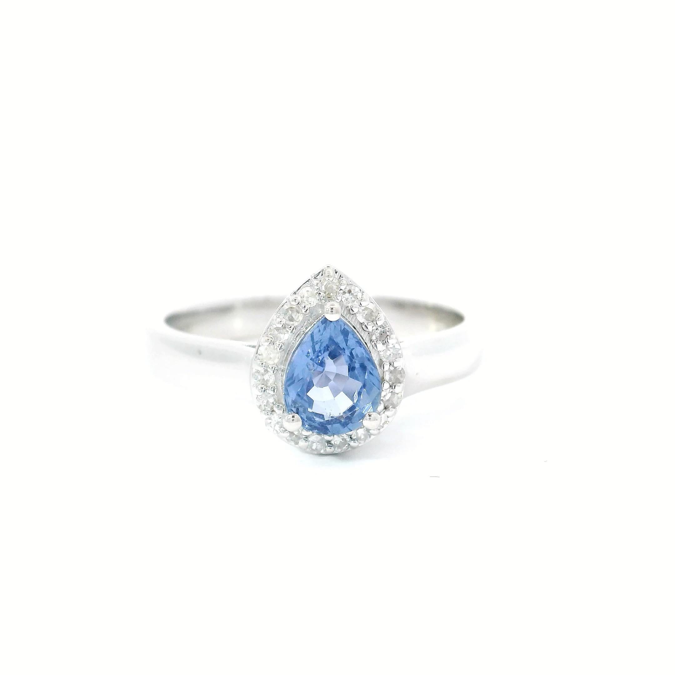 18kt white gold Sapphire Ring
  
  Gold colour & carat: White gold 18kt
  Weight: 3.76 grams
  
  Set with-
  Stone type: Diamond
  Shape: pear
  Carat: 0.66 cts
  Colour: blue Colour
  
  Surrounding Stones: Diamonds
 1) White Diamonds
  Carat