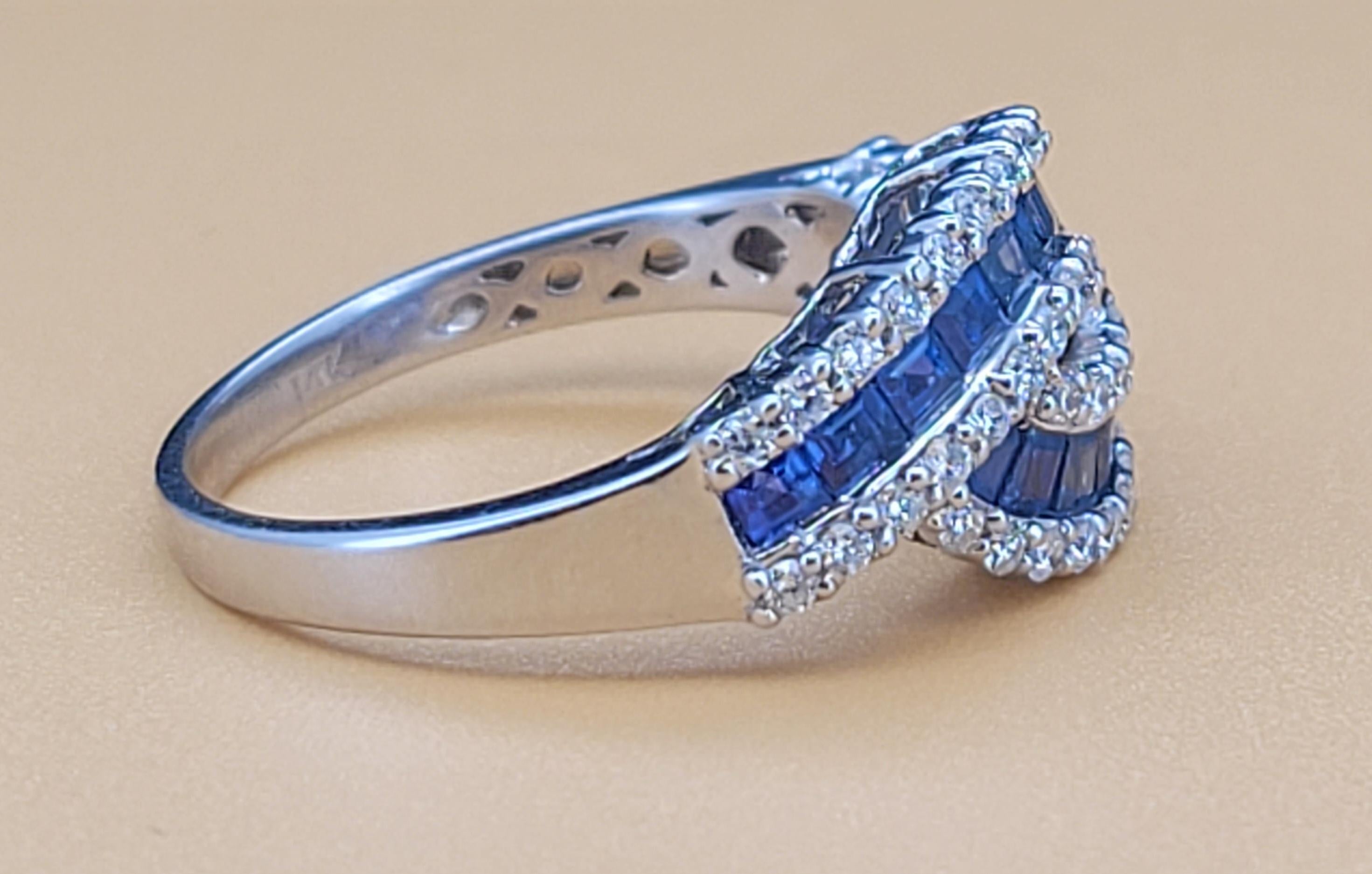 Beautiful Ring! 
Diamonds & (Chanel Set) Blue Sapphires.
Material: 14K White Gold 
Sapphire: .80ct 
Diamonds: .50ct 
Ring Size: 6
Ring Weight: 3.5gr
Condition: Like New
Retail Price: $3,900