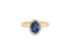 14k gold ring with oval sapphire