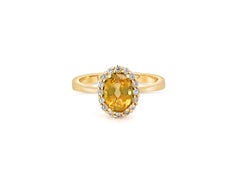 Sapphire ring with diamond halo.