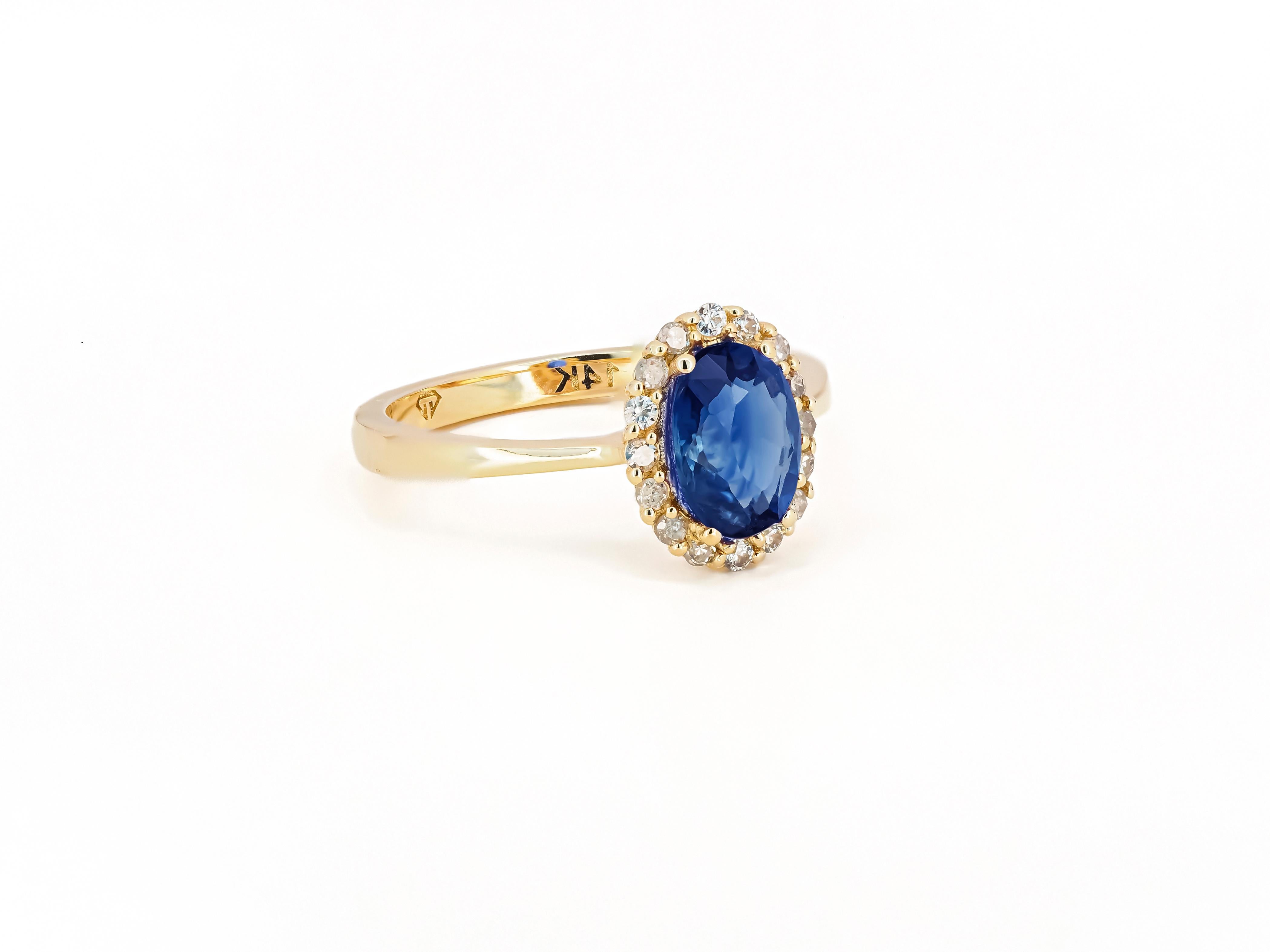 Modern Sapphire ring with diamond halo. For Sale