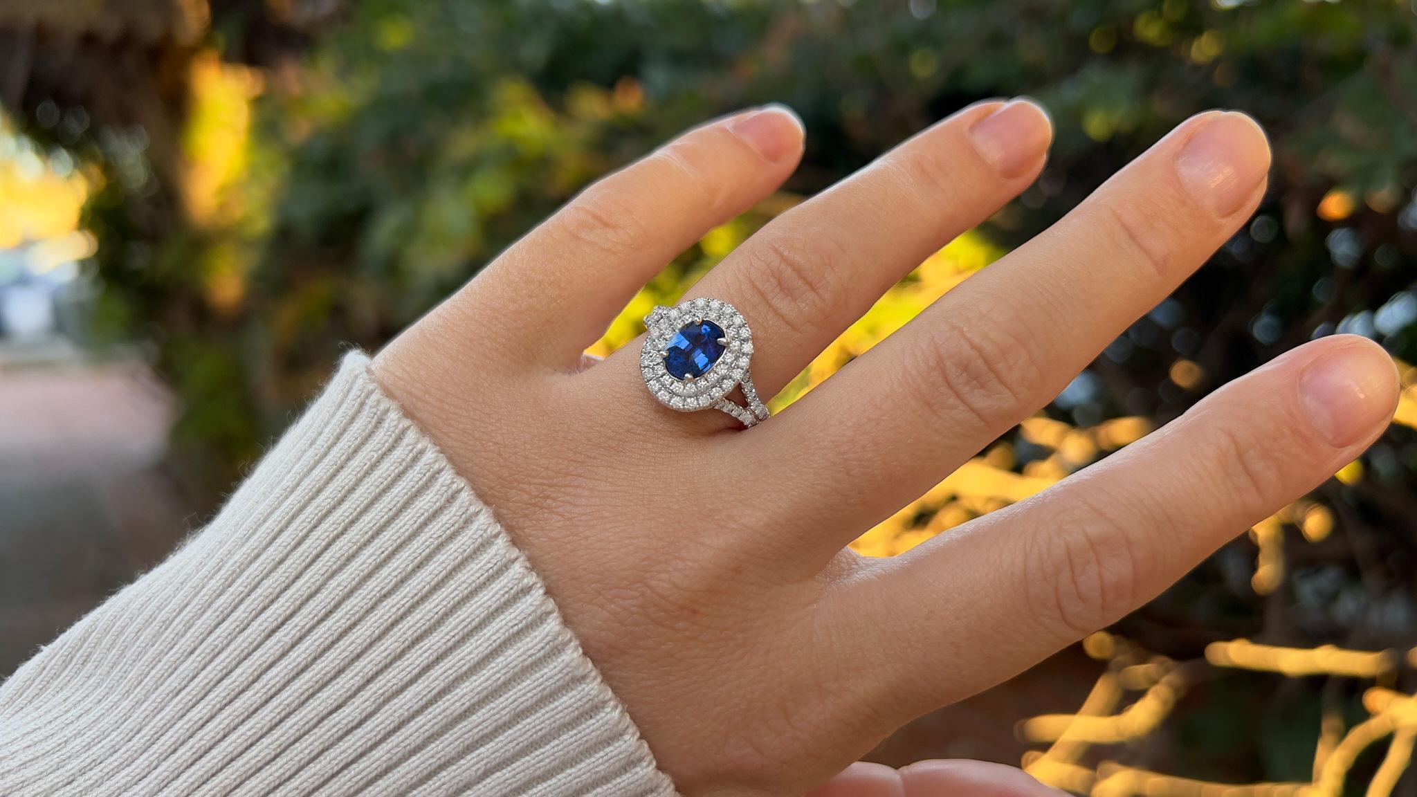 Oval Cut Sapphire Ring With Diamonds 2.03 Carats 18K White Gold For Sale