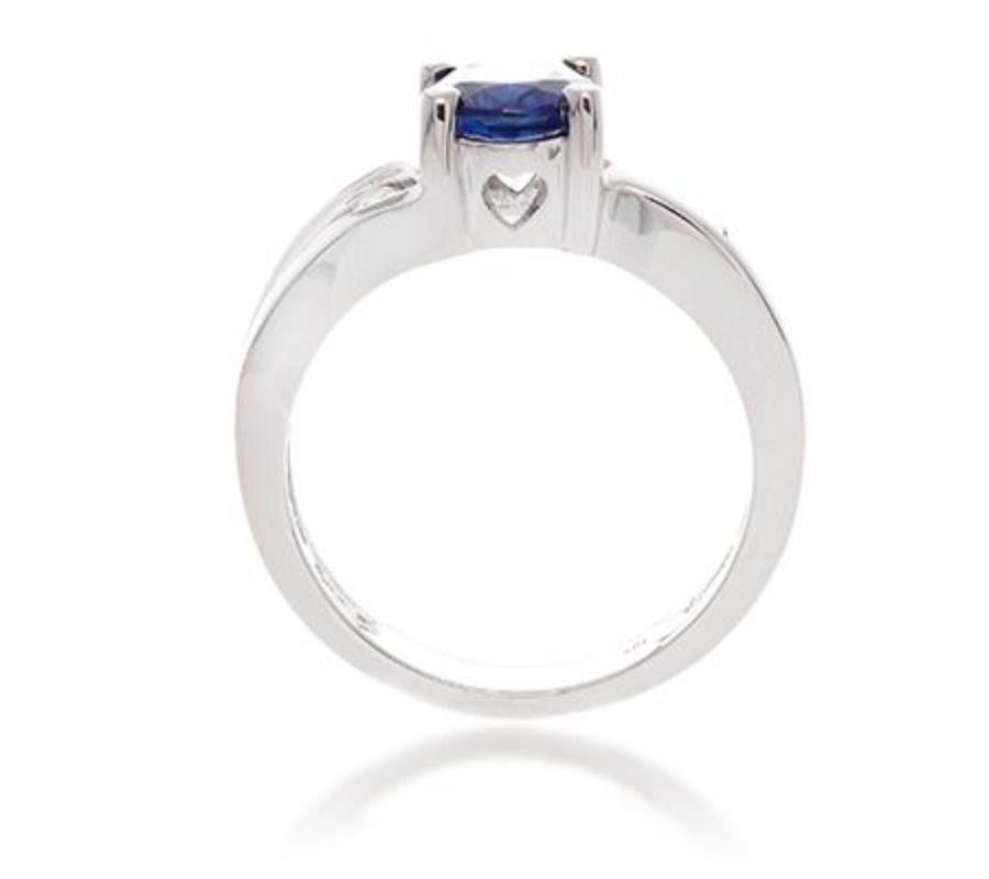 Modern 18k White Gold 1.52ct Sapphire Ring with .23ct Diamonds For Sale