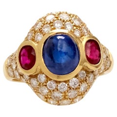 Bague en or 18 carats saphir, rubis et diamant