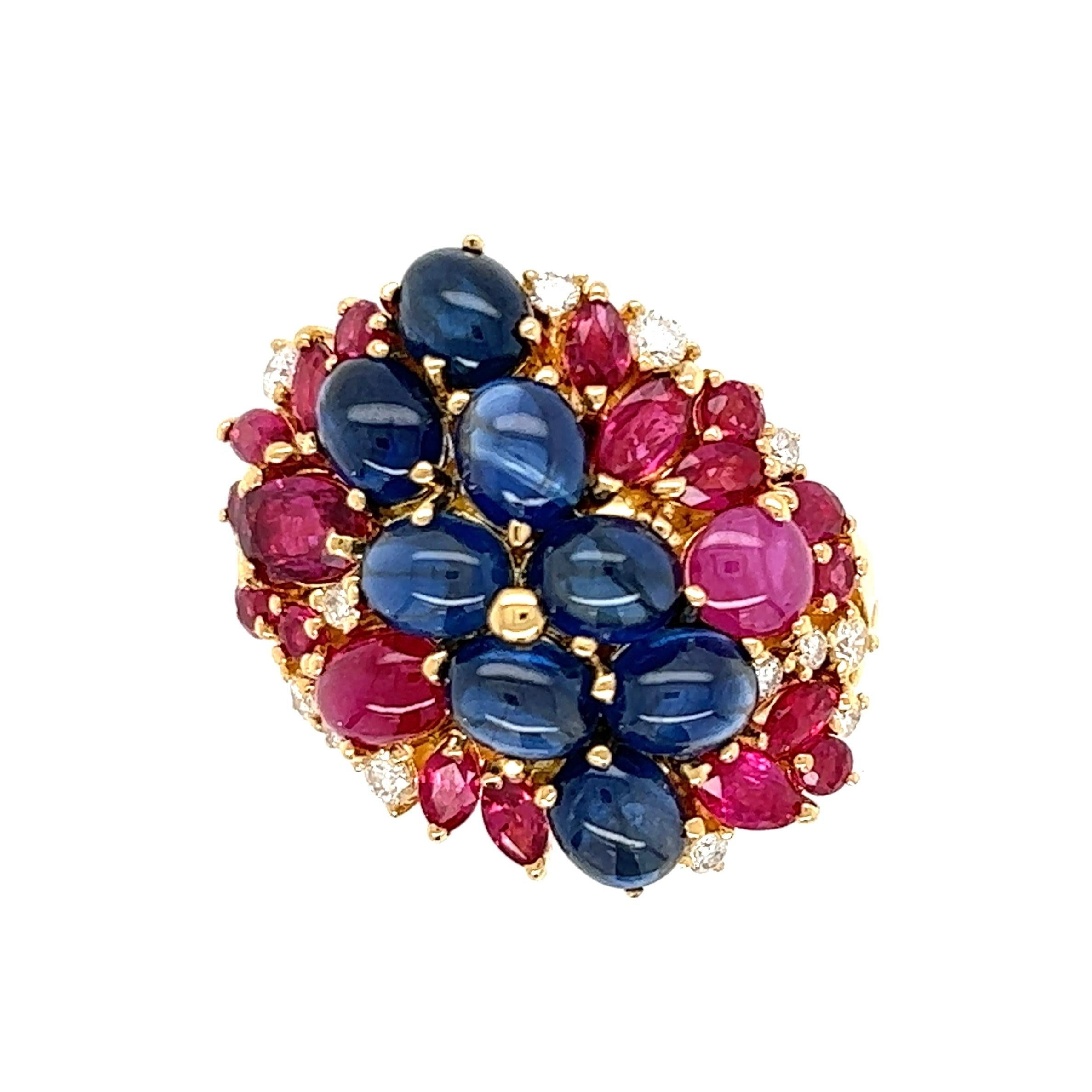 Simply Beautiful! Finely detailed Gold Cocktail Cluster Ring. Hand set with Sapphires, Rubies, weighing approx. 7.26tcw and Round Brilliant-Cut Diamonds, approx. 0.26tcw. Ring size 6; we offer ring re-sizing. Measures approx. 1.04” L 0.86” W x 0.84”