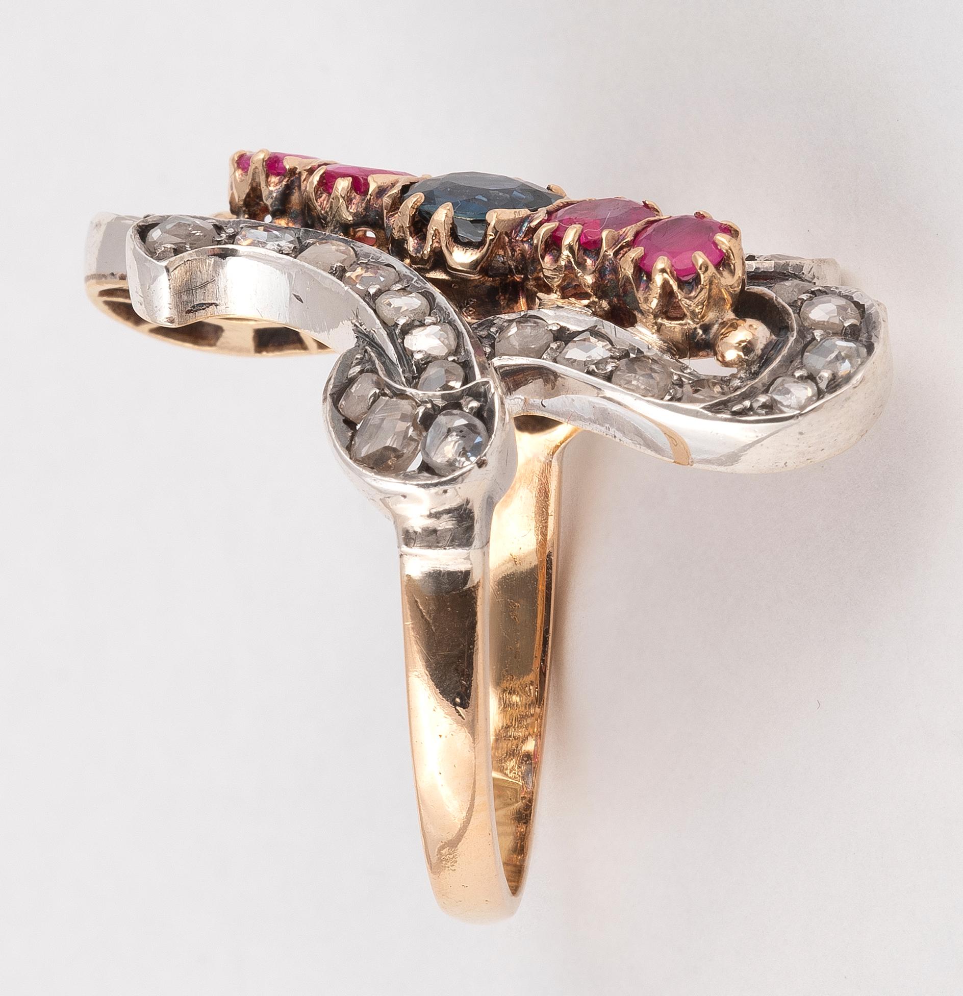 
Long design with sapphire rubies and rose diamond ring
Size: 7
Weight: 8,5gr.