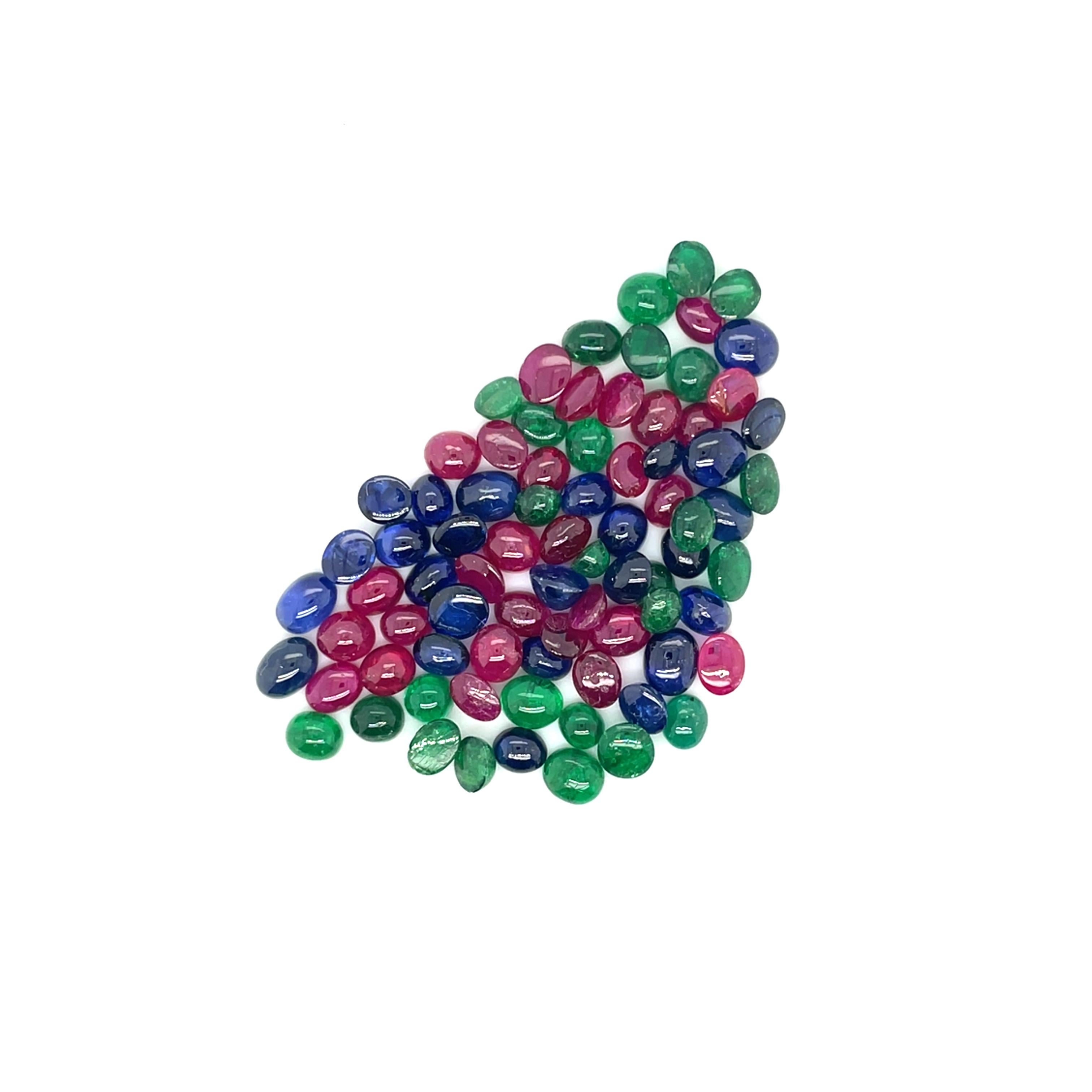 This exquisite collection of 80 sapphire, ruby, and emerald cabochons, totaling 39.54 carats. 

These gems, sourced from Burma and Zambia, radiate timeless beauty and sophistication.

Sapphires exude wisdom and royalty, rubies symbolize passion and