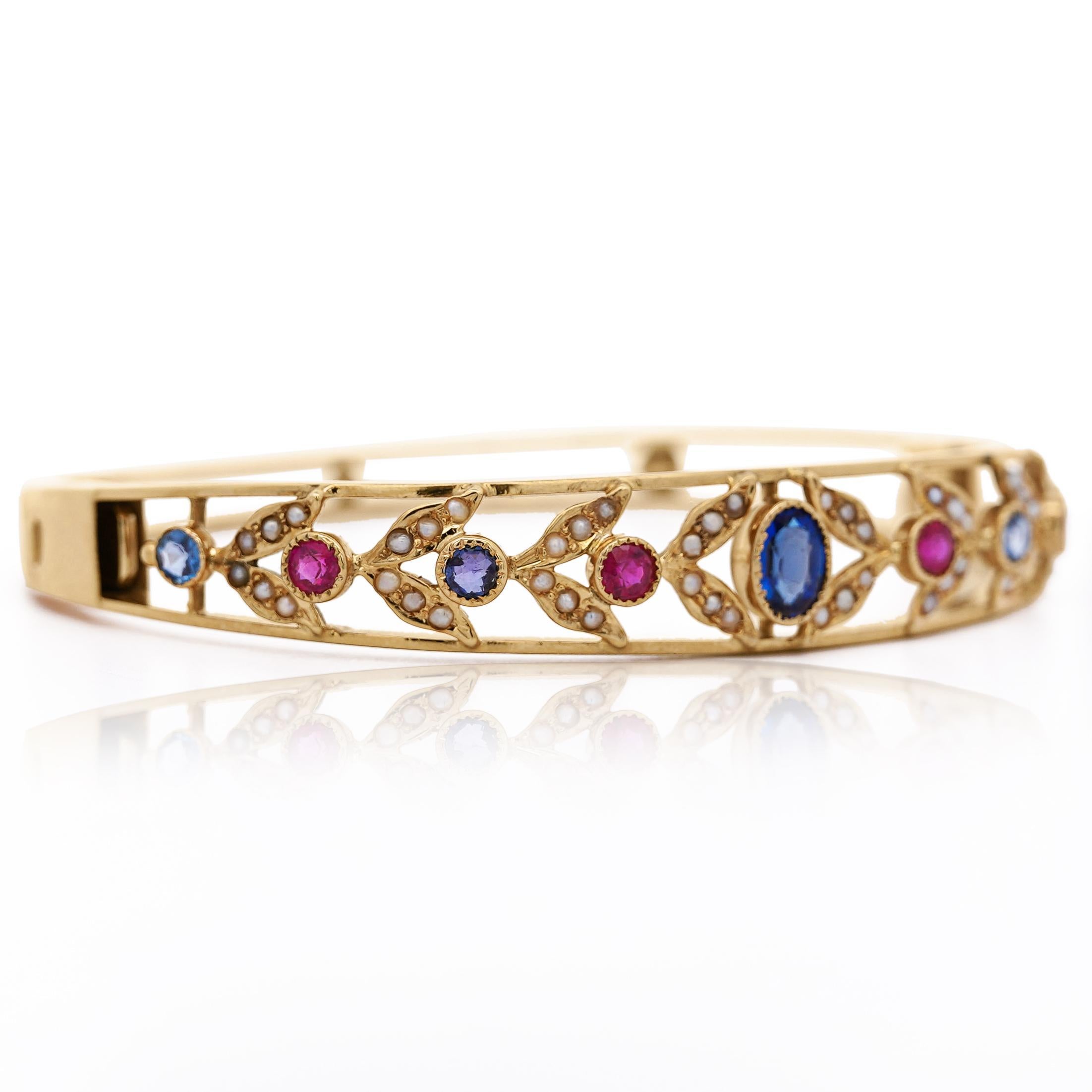 Oval Cut Sapphire, Ruby, & Seed Pearl 14K Gold Openwork Bangle Bracelet For Sale