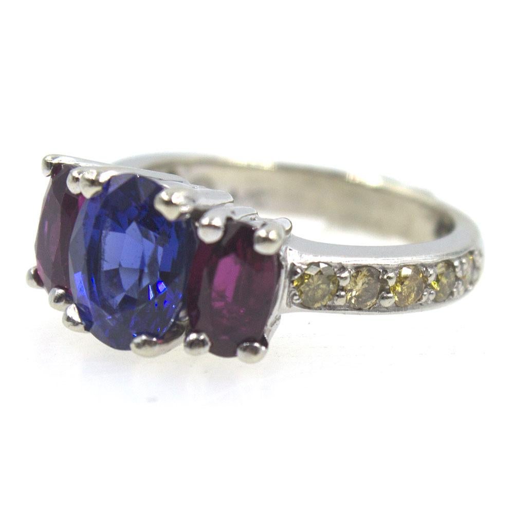 Modern Sapphire Ruby Three-Stone Platinum Estate Ring