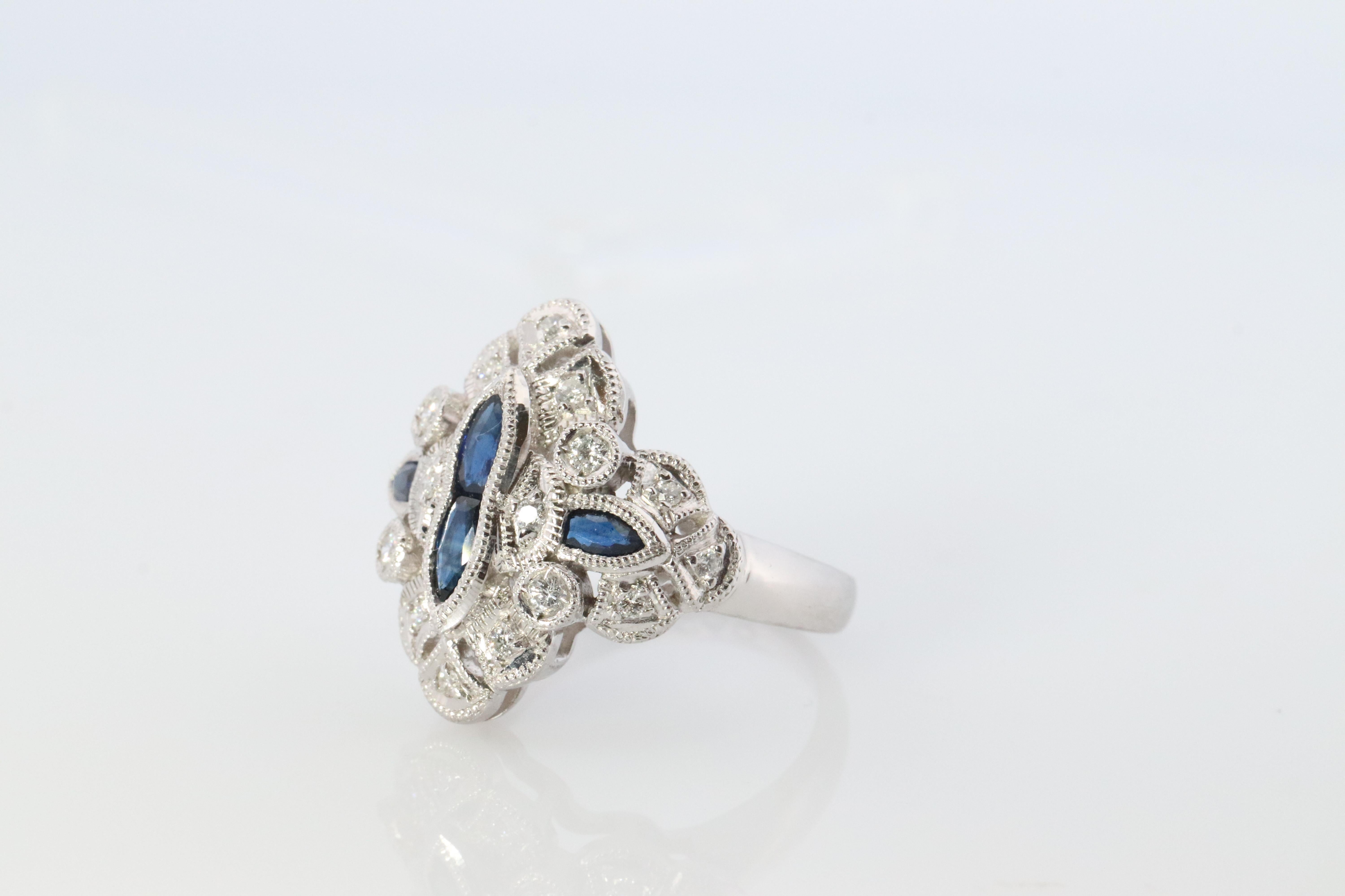 Art Deco Sapphire shield ring. Platinum Shield Ring. Sapphire and Diamond wide band. For Sale