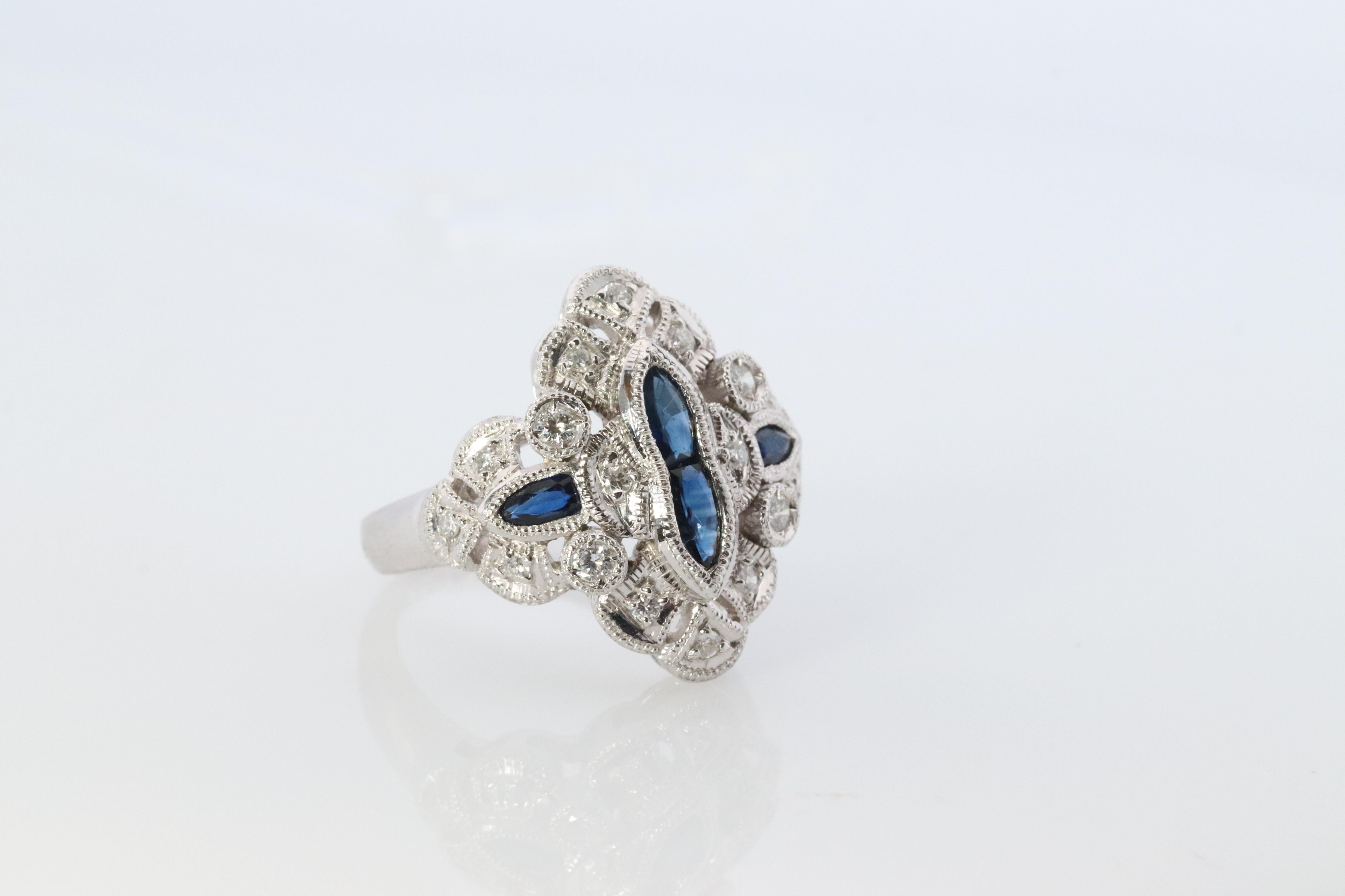 Sapphire shield ring. Platinum Shield Ring. Sapphire and Diamond wide band. In Good Condition For Sale In Port Charlotte, FL