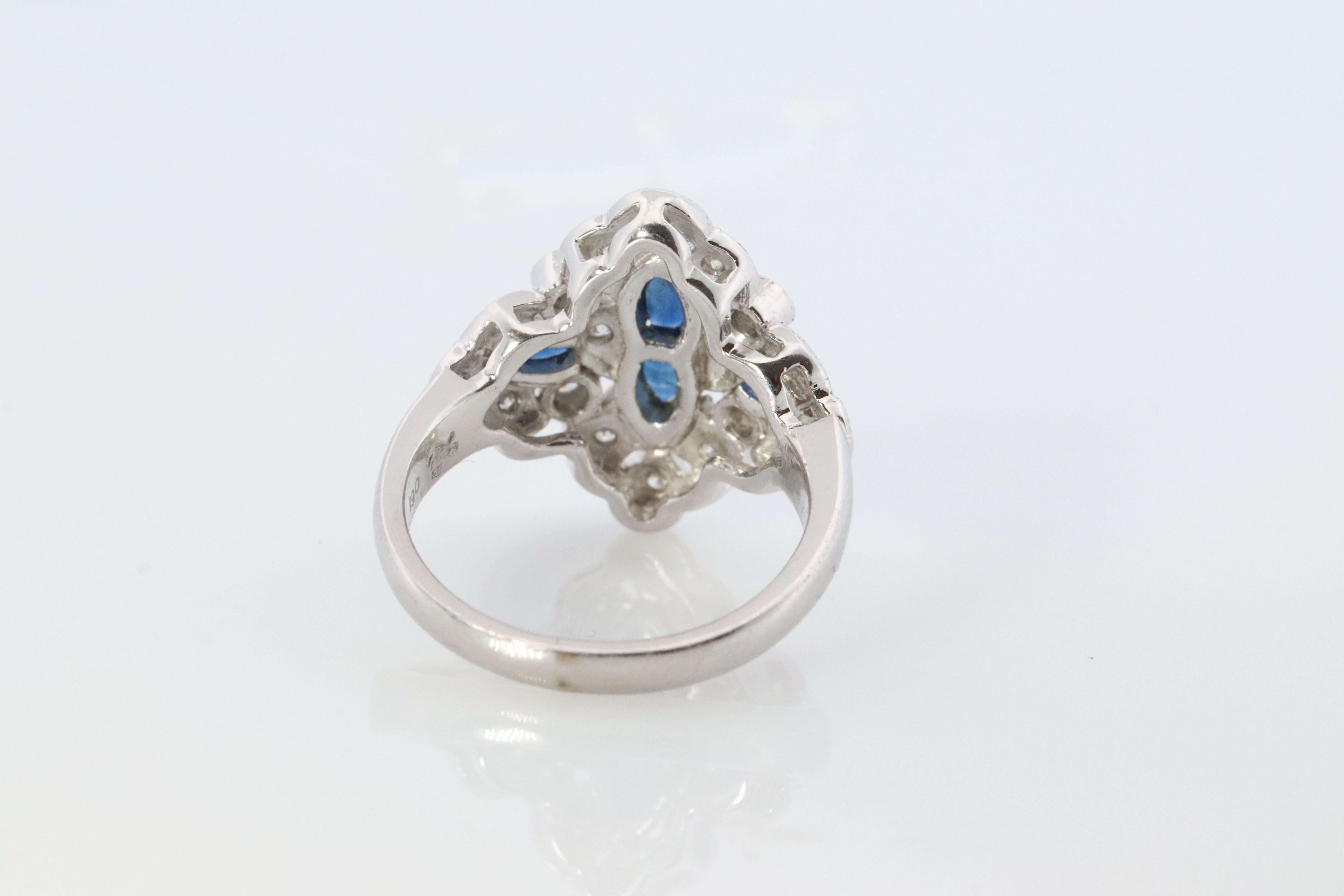 Women's Sapphire shield ring. Platinum Shield Ring. Sapphire and Diamond wide band. For Sale