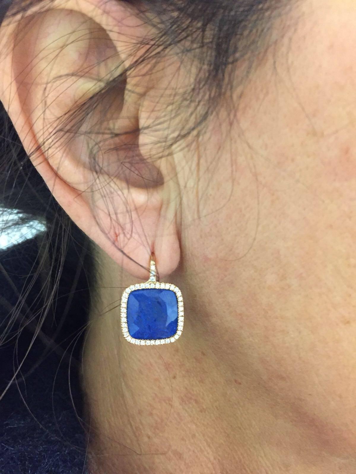 Sliced Sapphire cushion shape earrings, these have an amazing look on the ear.
They are made in Italy and are 18k white gold.
The diamonds surrounding the sapphire frame the royal blue color.
Diamond weight 0.38
