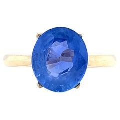 Sapphire solitaire engagement ring 18k yellow gold