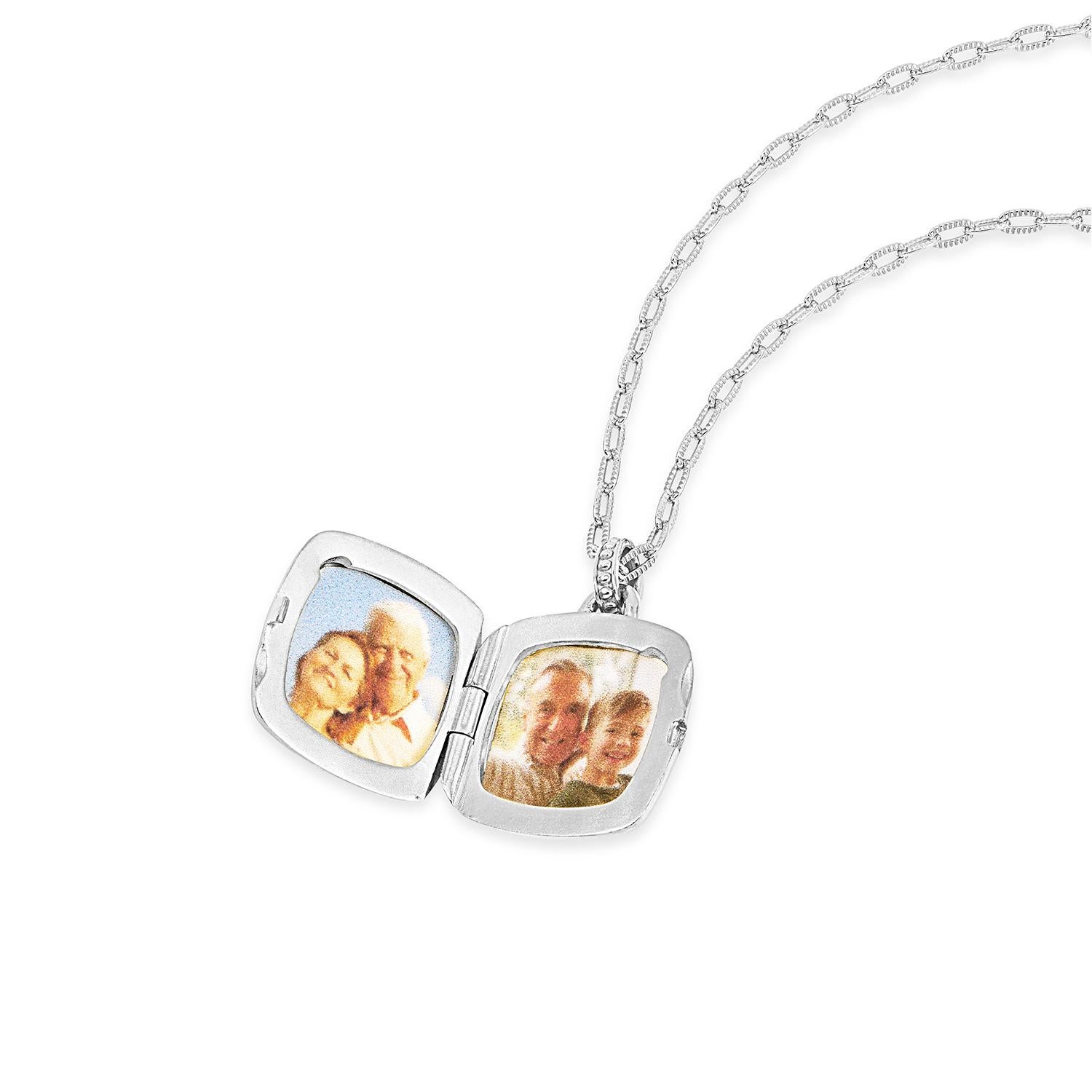 Cherish your treasured memories with our distinctive sterling silver 'Stellar' locket. The cushion-shape design features an intricately carved star inside an engraved frame, with a sparkling white sapphire set in the centre. The locket is suspended