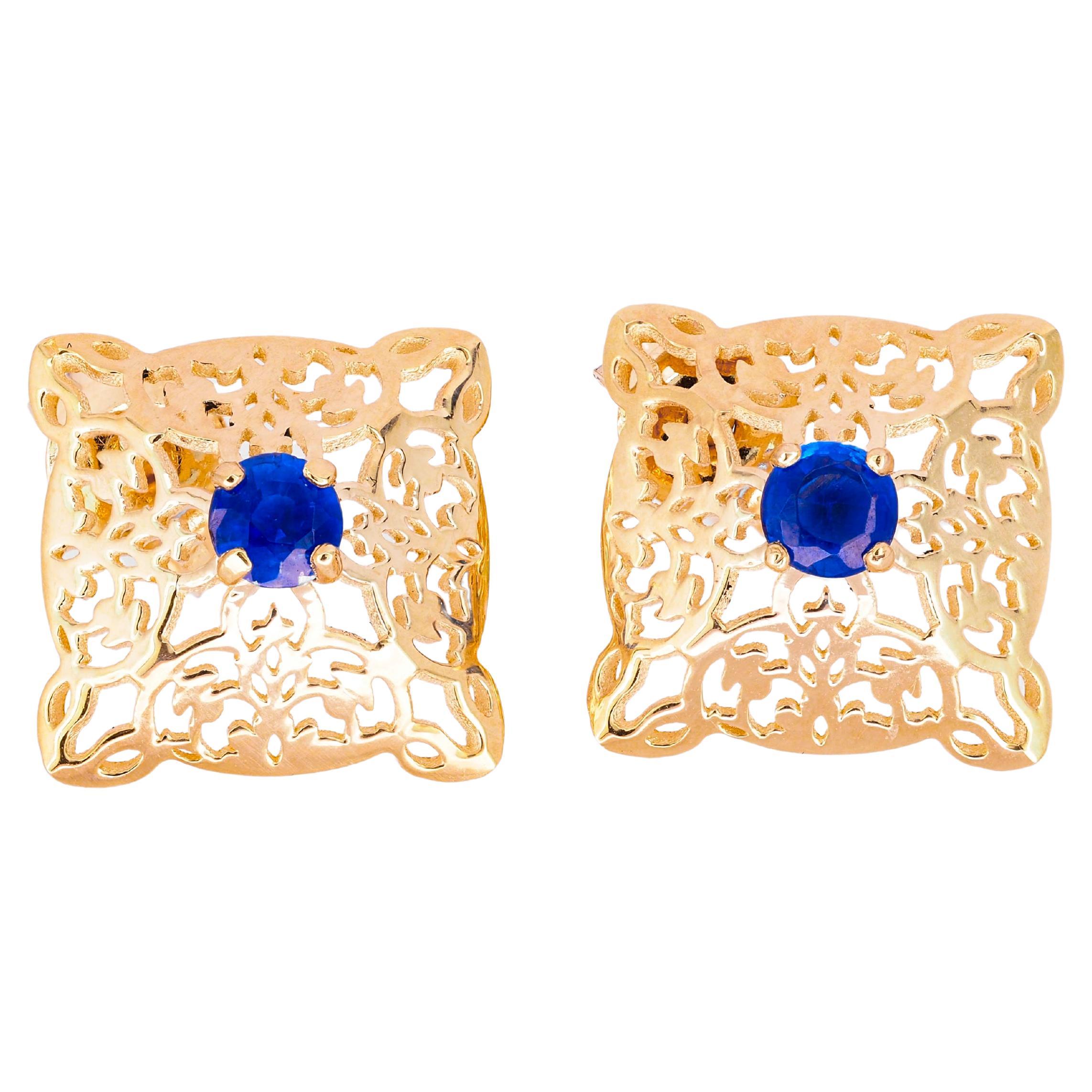 Sapphire stud earrings in 14 k gold. 