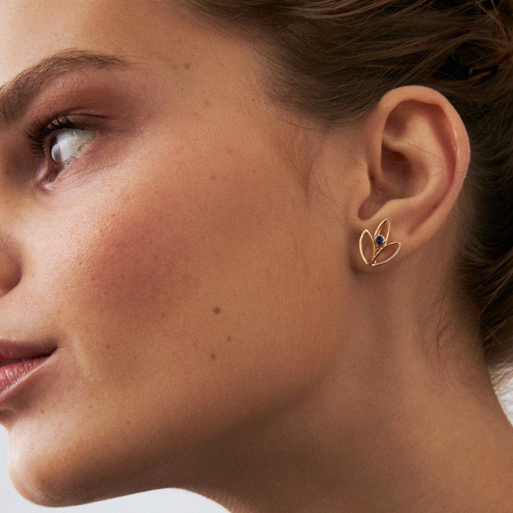 Introducing the 14K Solid Gold Sapphire Stud Earrings, an embodiment of Orena Jewelry's unwavering commitment to exceptional craftsmanship. Every earring is attentively crafted, radiating a luxurious charm coupled with ageless elegance. They are a