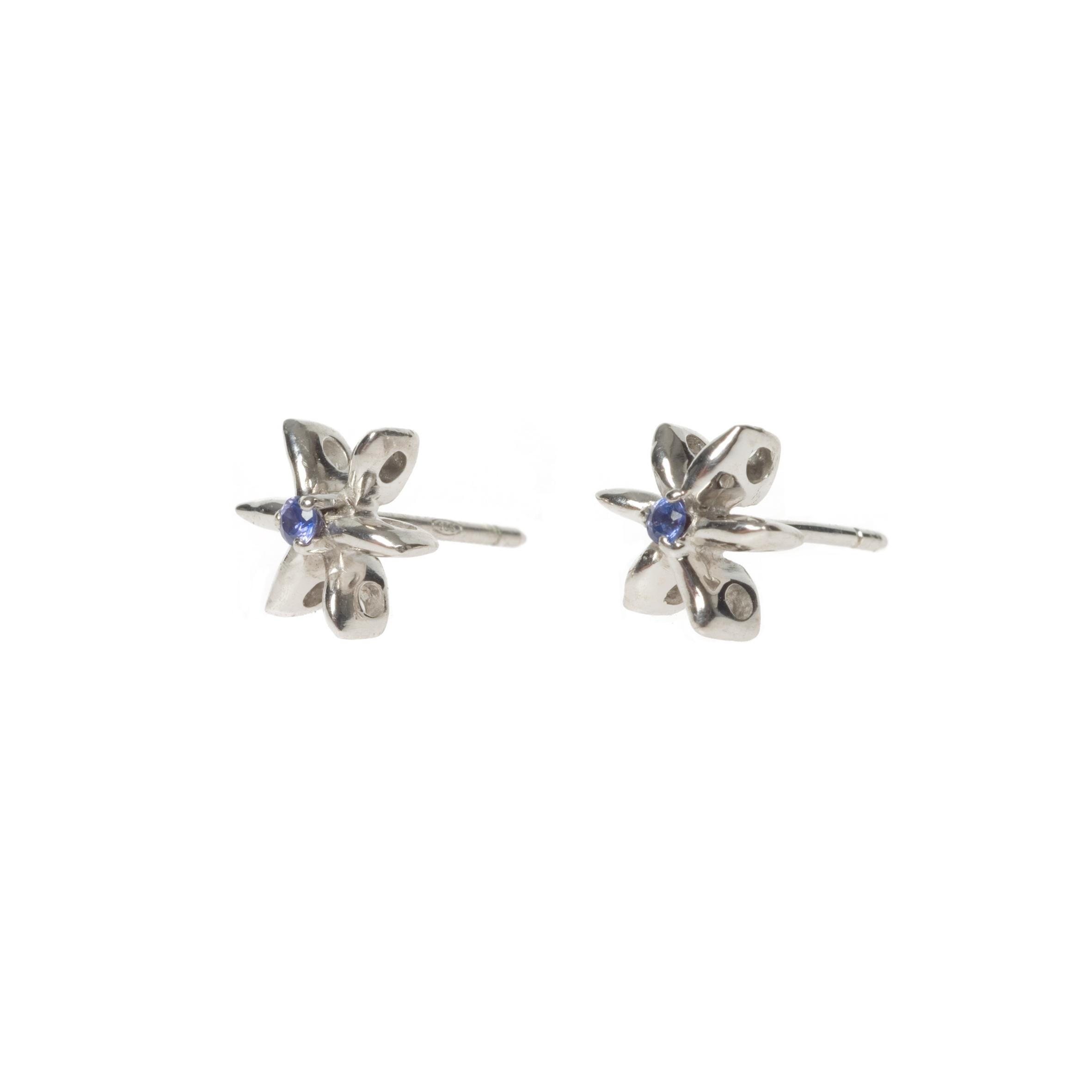 These pretty dainty Daisy earrings have been set with Blue Sapphires in White Gold. We think they look fabulous in White Diamonds or with other birthstones too and can make these to order in our workshop in Italy for you. I would be delighted to