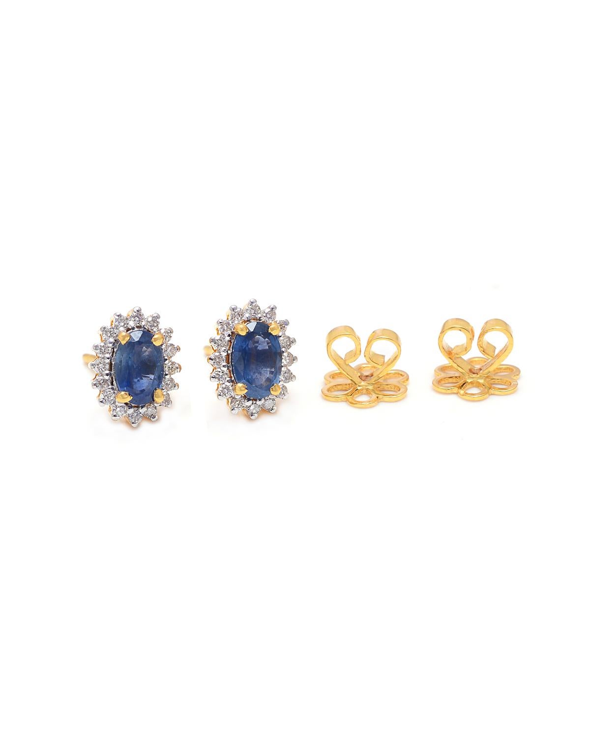 Astonishing sapphire gemstone stud earrings in 14k yellow gold and natural diamonds makes your heart smile and grab every attention. 

 Specification:-	
Gross Weight:   2.36 gms
Gold Weight:  	2.11 gms
Diamond Weight: 0.23 ct
Sapphire Weight: 1.07