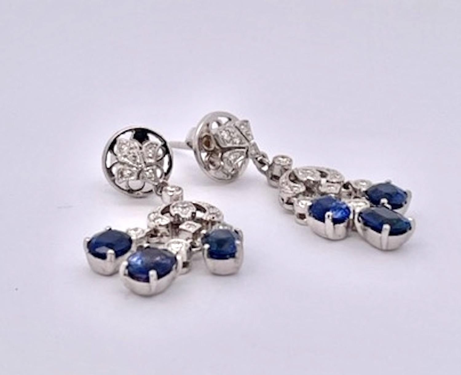 Just received from a London auction, these tassel drop earrings are divine.  These Sapphire tassel earrings have extra beautiful clean clear deep Blue Sapphires and are made in 18K White Gold. These Sapphire Tassel Drop Earrings features a fleur de