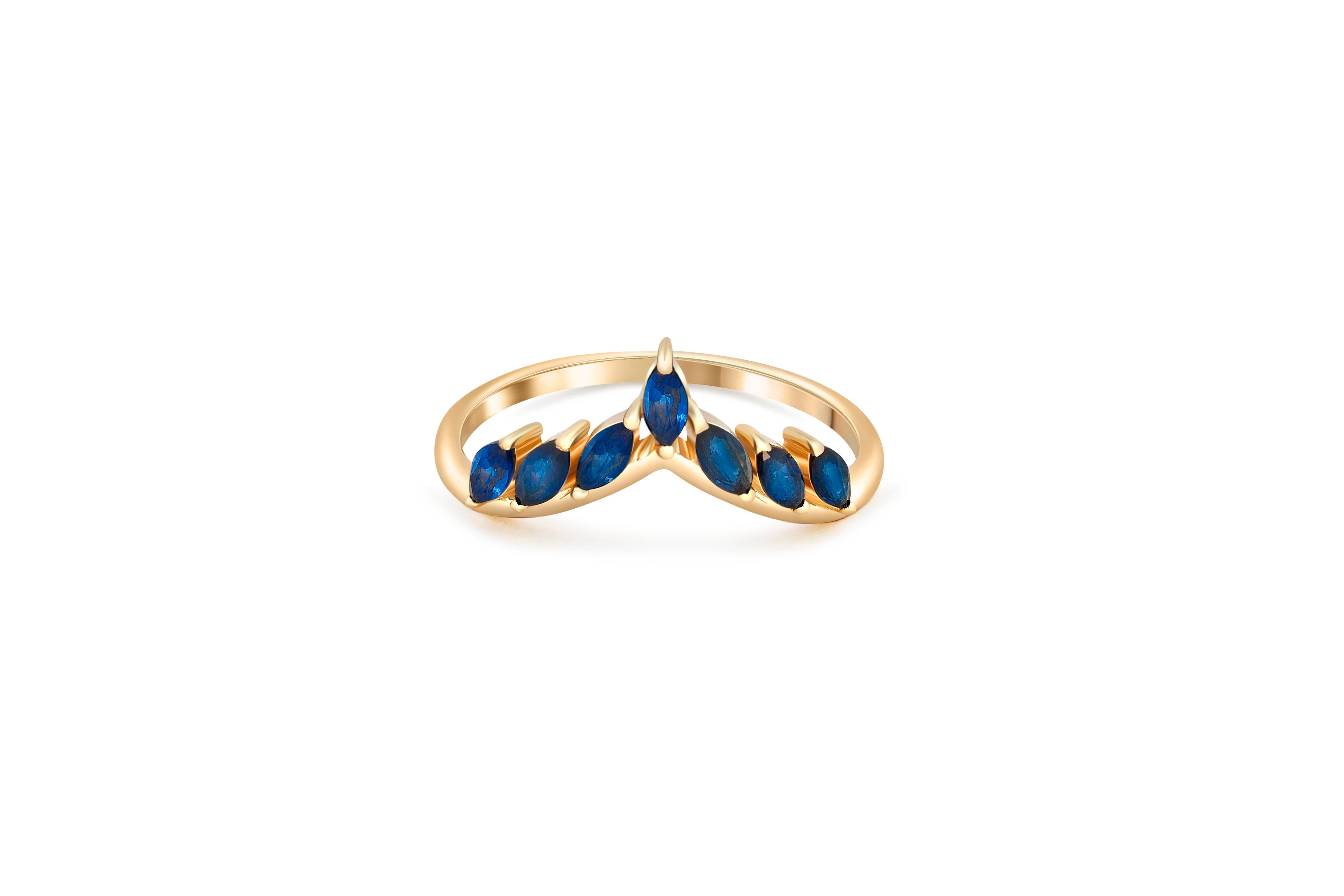 Sapphire Tiara 14k gold ring. 
Crown sapphire ring. Marquise sapphire ring. Blue sapphire ring. Stackable sapphire band.

Metal: 14 karat gold
Weight: 1.85 gr. depends from size.

Sapphires: 7 pieces, 0.15x7 = 1.05 ct total, marquise shape, yellow,
