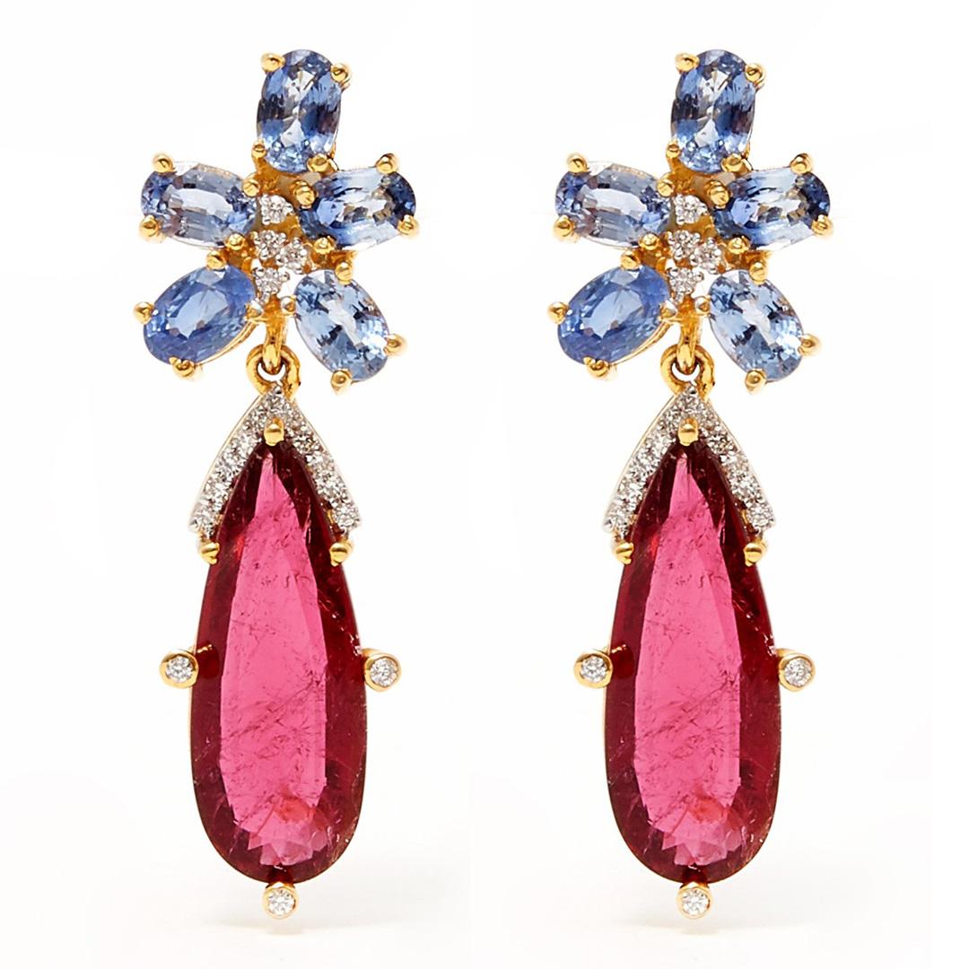 Spectacularly beautiful drop earrings featuring luminous Blue Sapphire petal flowers with Brilliant Cut Diamond centers suspending Pinkish Purple pear shaped Tourmalines set with more Brilliant Cut White Diamonds.

- Blue Sapphires weigh approx 6.05