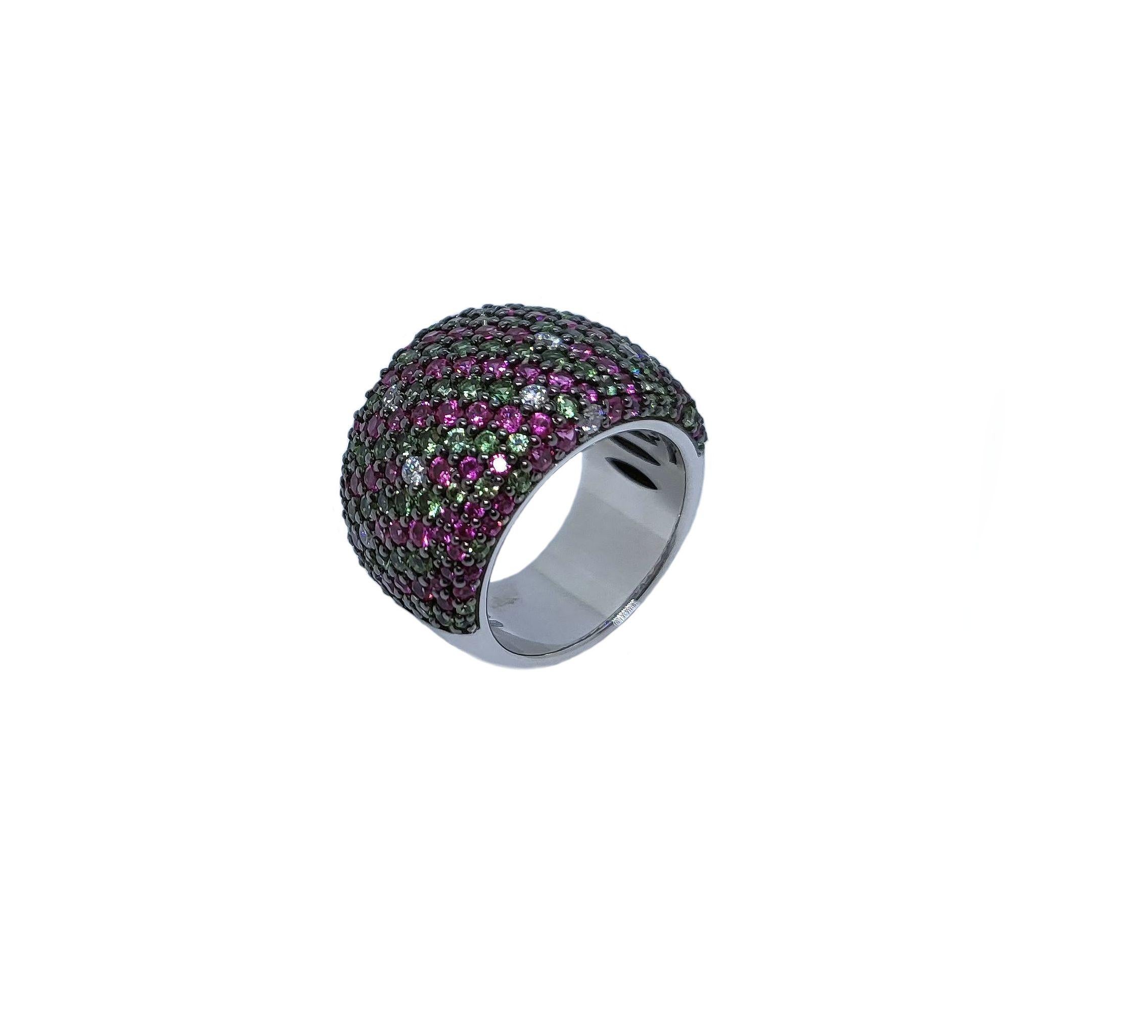 Elegant Paveé Ring made of White Gold, 2.68 carat pink sapphires and 2.68 carat green tourmalines, designed by Wagner Preziosen. 
The rich colors of this classy ring sparkle and shine in daylight as well as in candlelight - wear it with your office