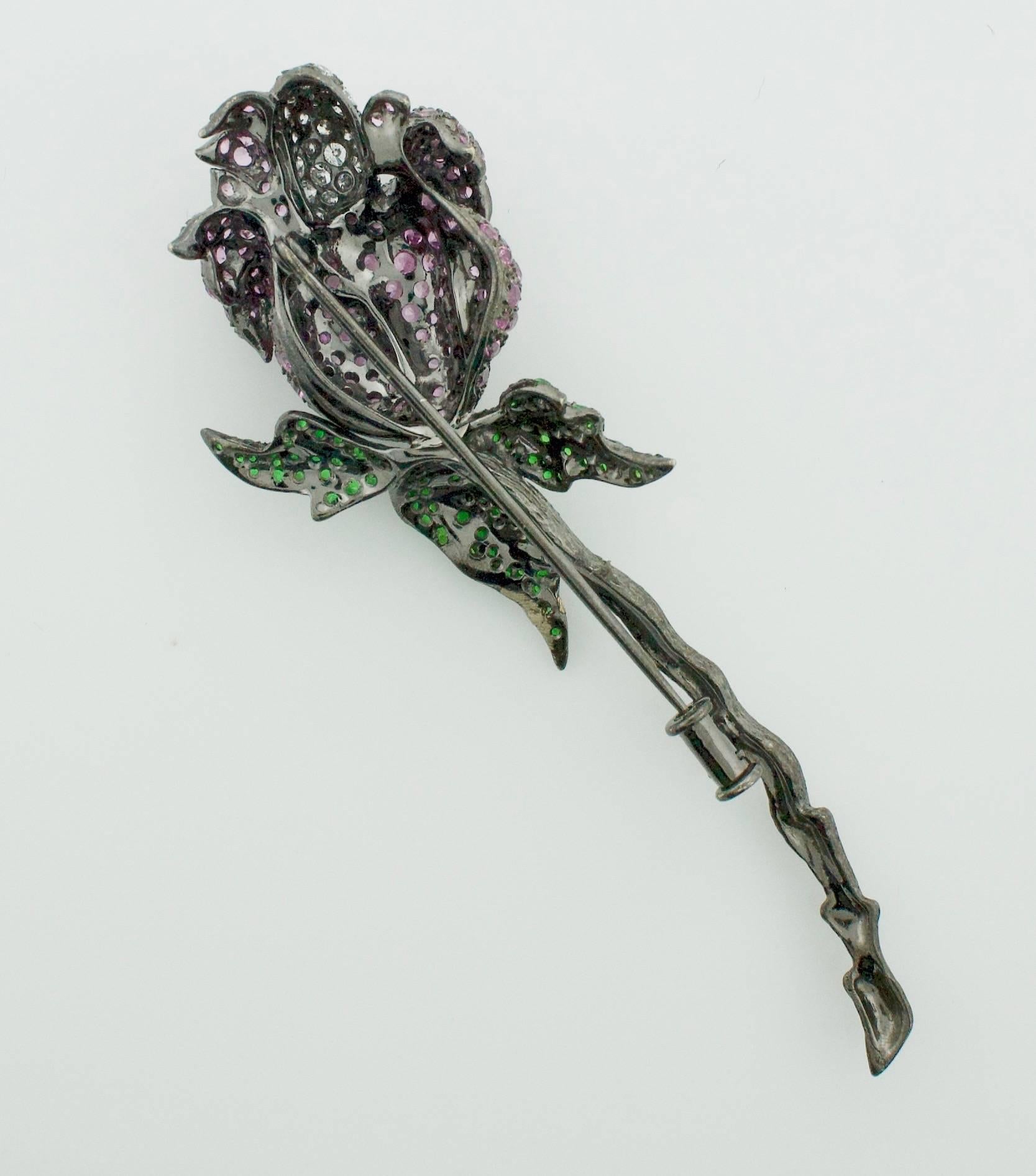 Round Cut Sapphire Tsavorite Garnet and Diamond Flower Brooch in 18 Karat Oxidized Gold For Sale