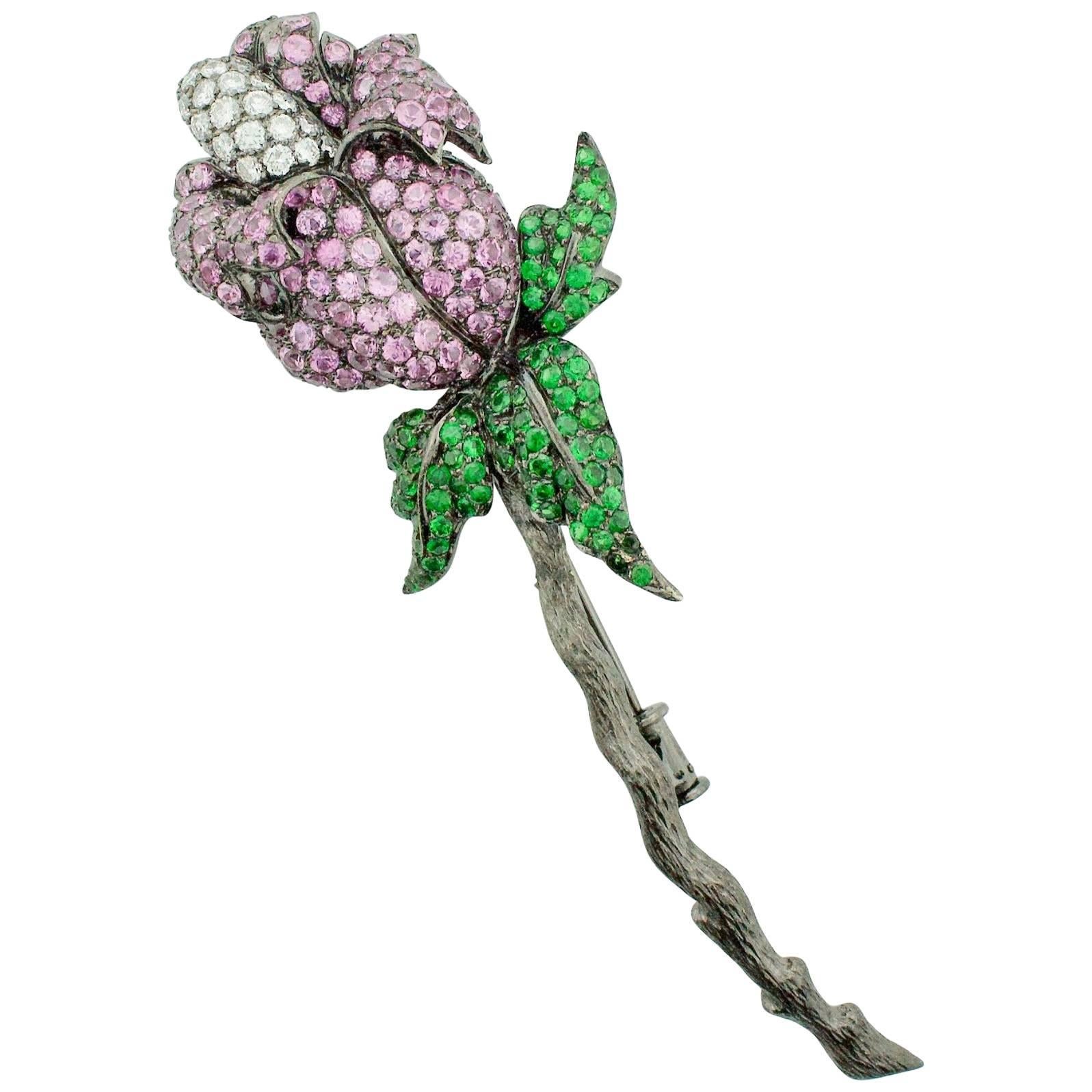 Broche fleur en or oxydé 18 carats, saphirs, tsavorites, grenats et diamants
