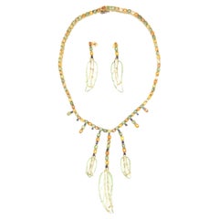 Parure et boucles d'oreilles en or jaune 18 carats avec saphirs et feuilles de quartz