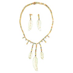 Parure et boucles d'oreilles en or jaune 18 carats avec saphirs et feuilles de quartz