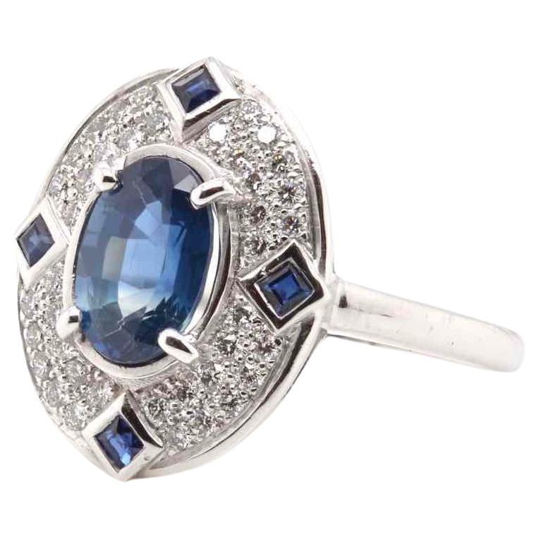Sapphires and brilliant cut diamonds ring in 18k gold For Sale