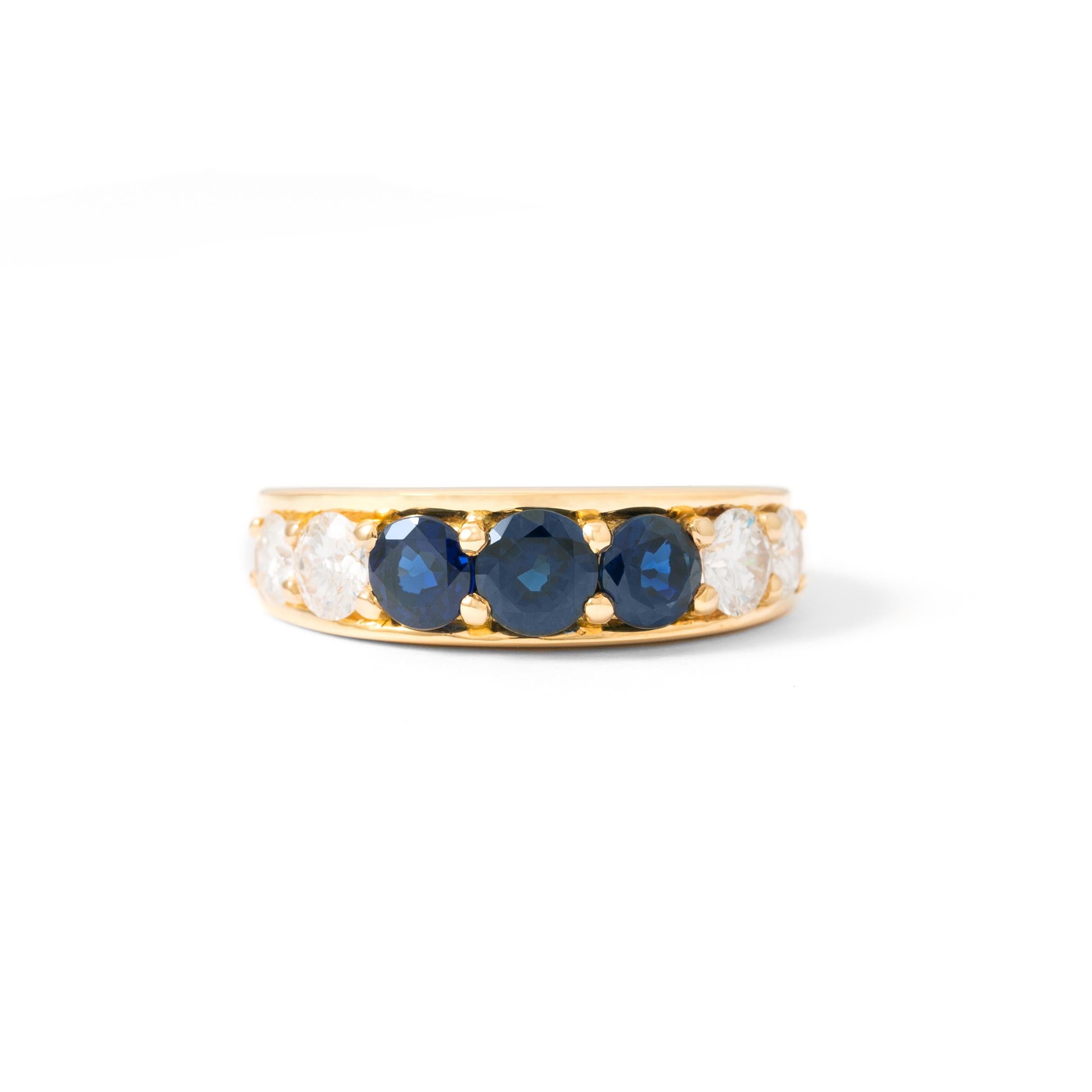Ring in 18kt yellow gold set with 3 sapphires and diamonds 0.75 cts      