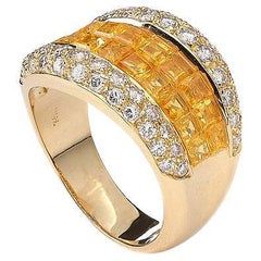Anello in oro con zaffiri e diamanti