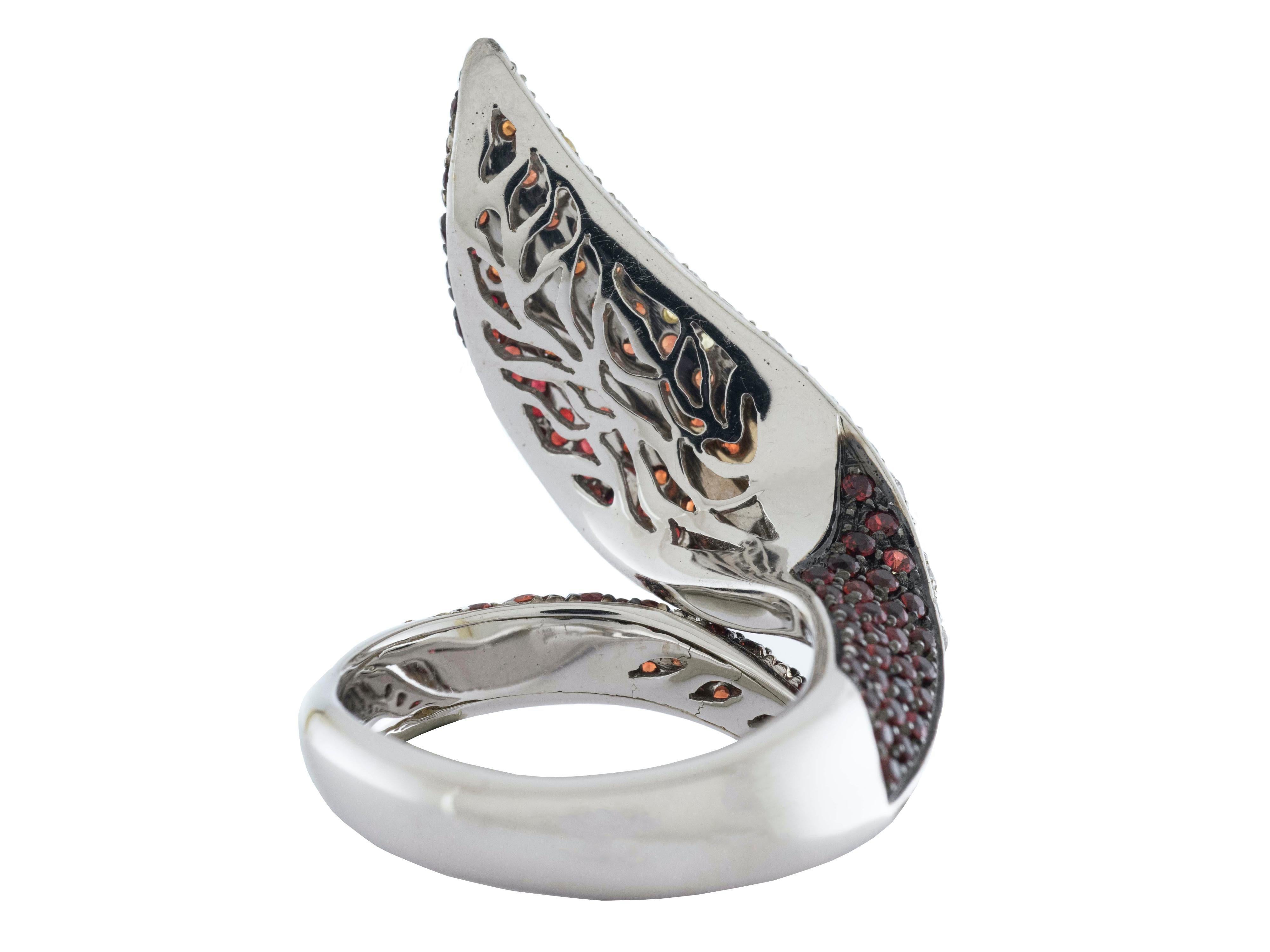 This gorgeous and harmonious leaf ring design comprised a beautiful combination of red and yellow Sapphires for Carat 3.04 and white Diamonds for Carat 0.37.
It has a perfect wearability and it is absolutely comfortable on the finger.
Designed and