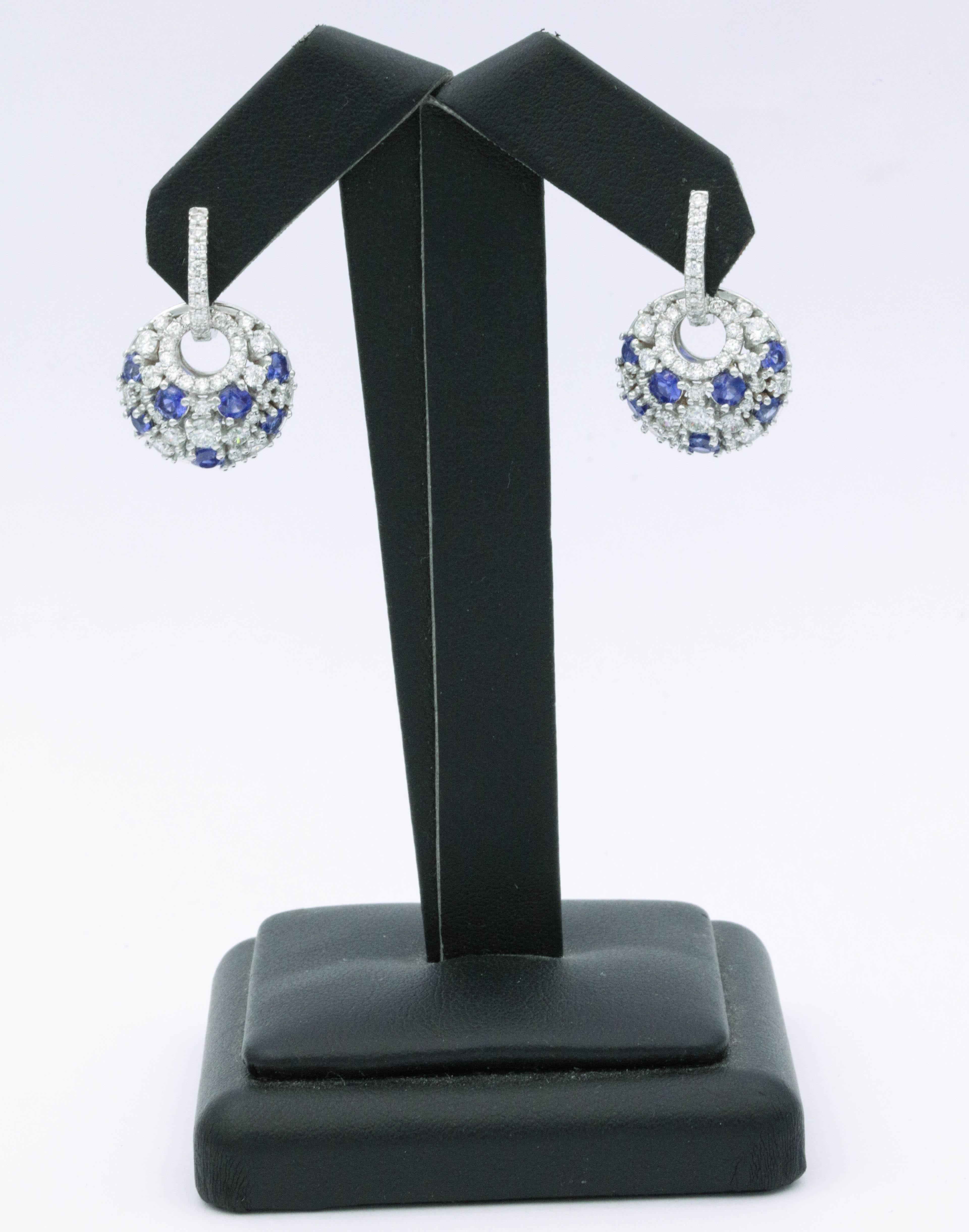 14 Sapphires 1.93 Cts
Diamonds 2.32 Cts. F-G SI 
18K white Gold
The Earring can be used as only Huggies too