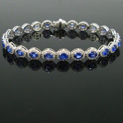 Sapphires and Diamonds Riviere Bracelet, 18kt White Gold