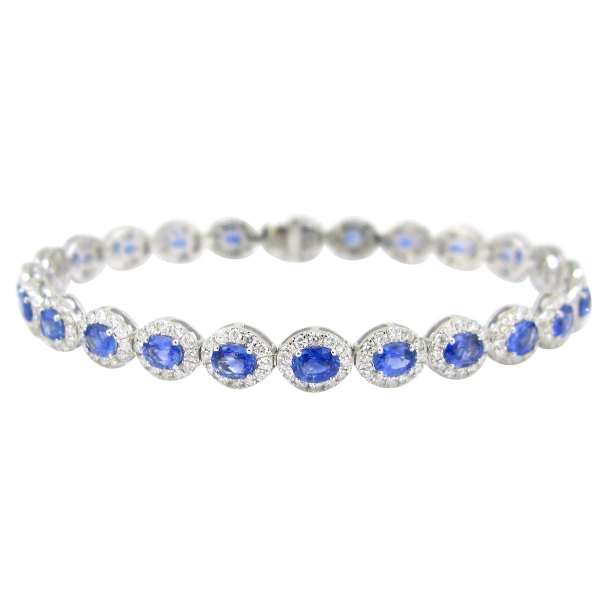 Bracciale Riviere con zaffiri e diamanti, oro bianco 18 carati