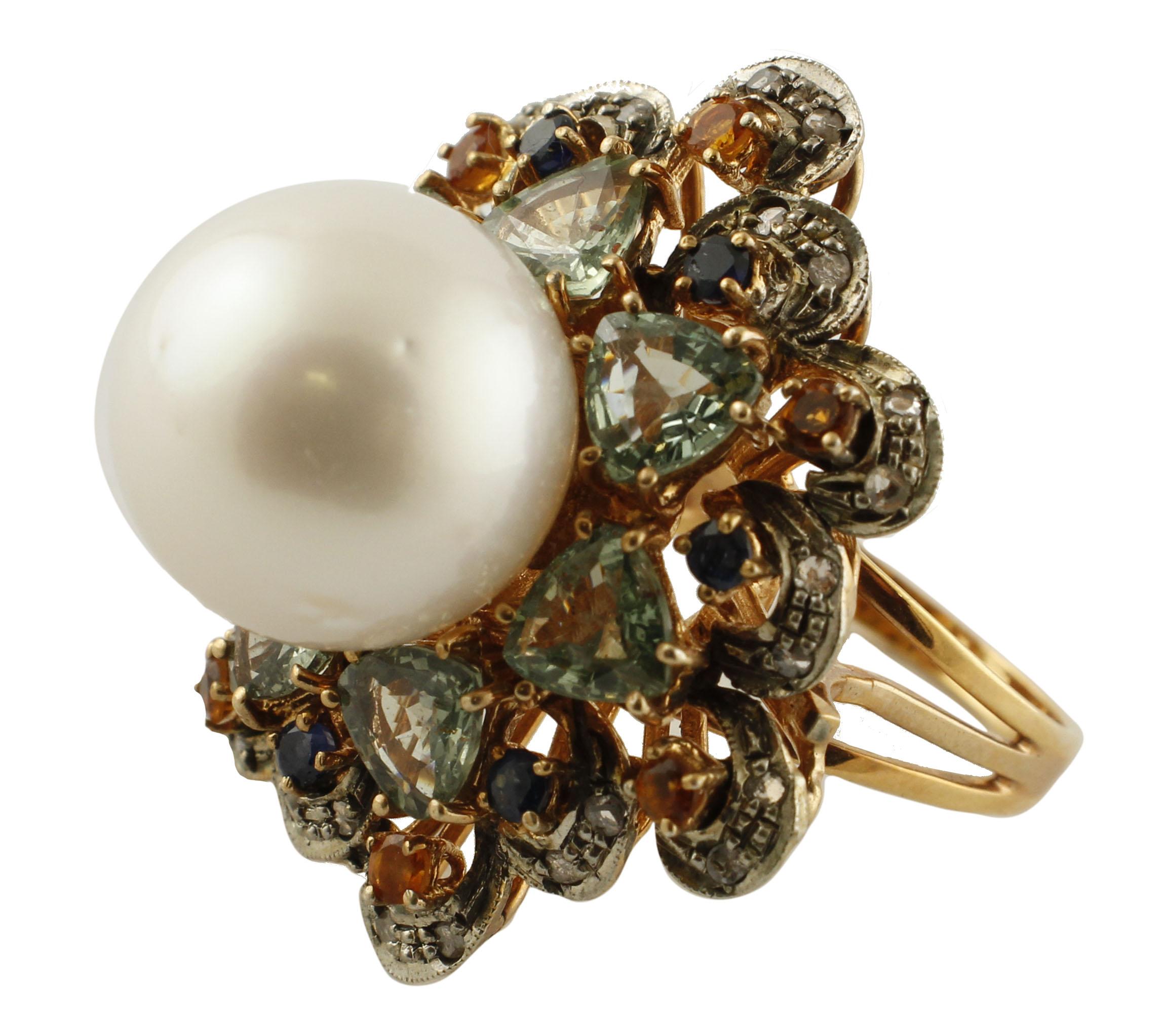 SHIPPING POLICY:
No additional costs will be added to this order.
Shipping costs will be totally covered by the seller (customs duties included).

Beautiful ring in 9 kt rose gold and silver, 3.1 cm wide, enriched with fabulous sapphires of green