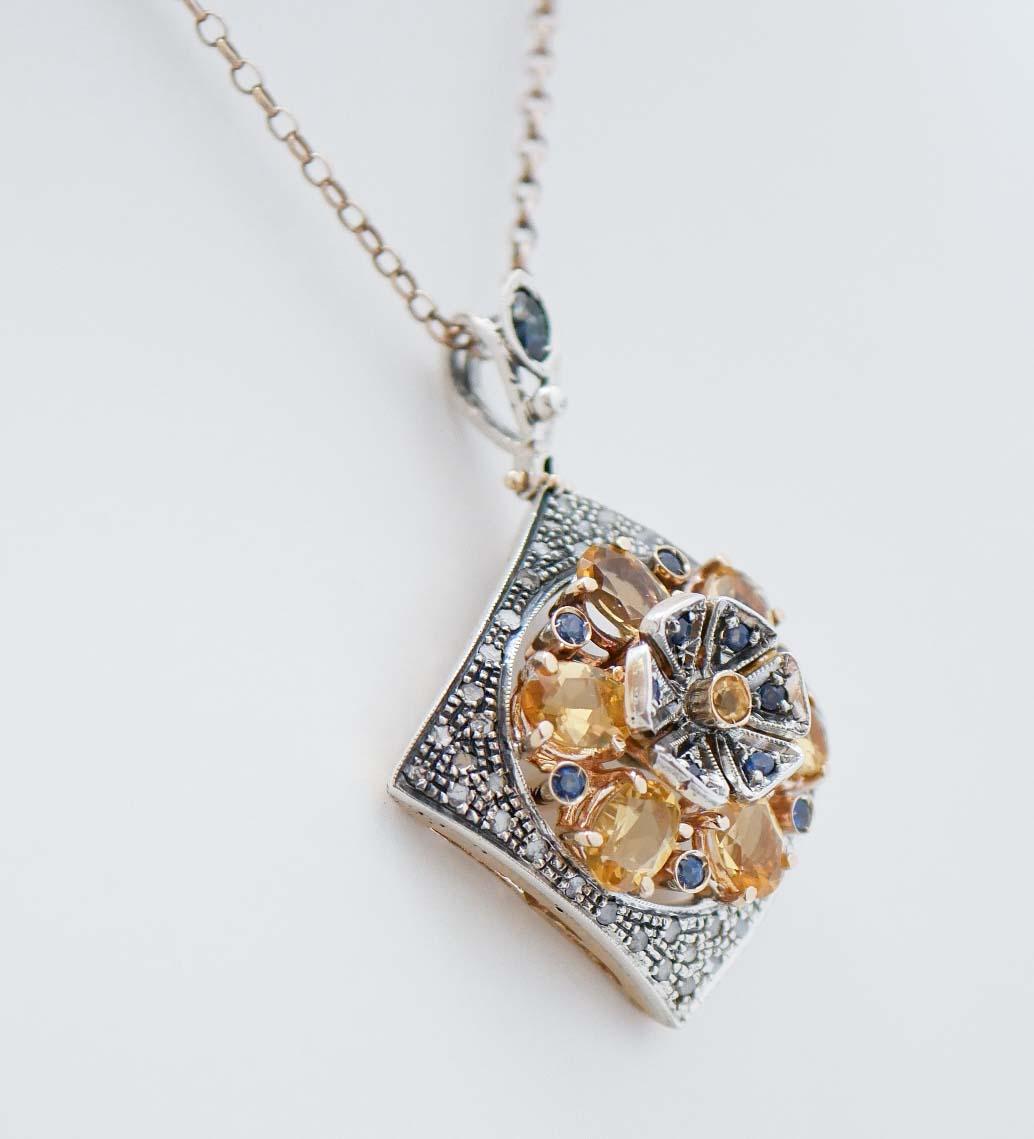 Rétro Saphirs, diamants, collier à pendentifs en or rose 14 carats et en argent. en vente