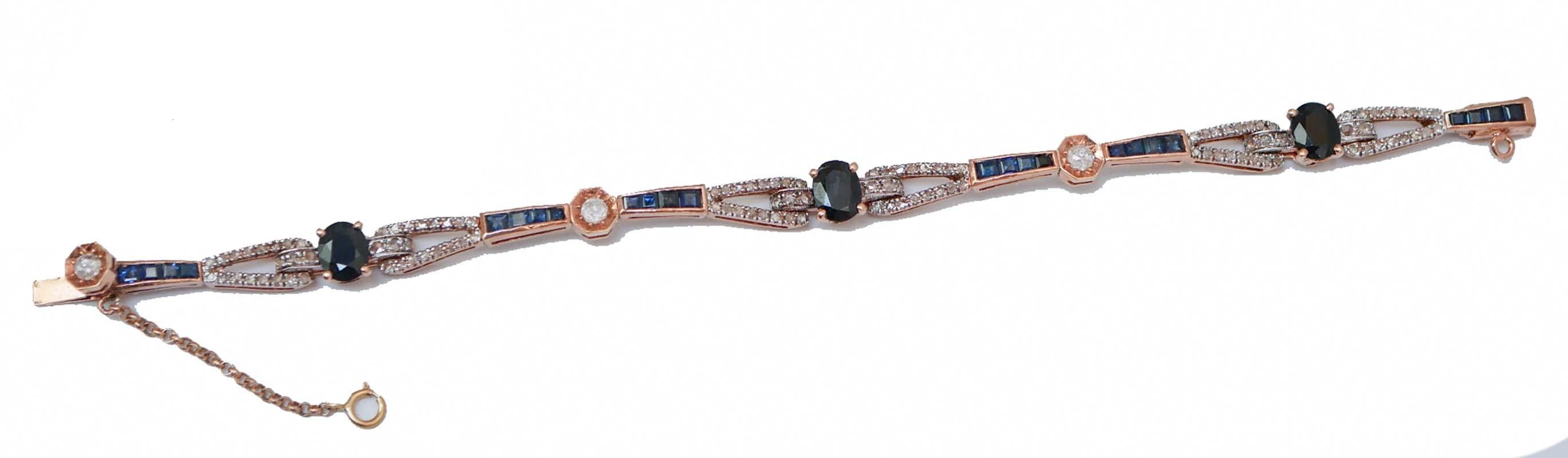 Pulsera Retrò de oro rosa de 14 quilates y estructura de plata montada con secciones de zafiros y diamantes. Entre ellos, un zafiro ovalado ( 7 mm x 5 mm ).
Diamantes 1,39 ct
Zafiros 5,78 ct
Peso total 11.40 gr
RF *OICU

Para cualquier información,