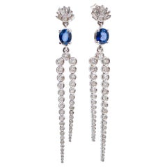Sapphires, Diamonds, 14 Karat White Gold Earrings. Sapphires, Diamonds, 14 Karat White Gold Earrings.