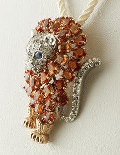Sapphires, Diamonds, 14 Karat Rose and White Gold Lion Brooch